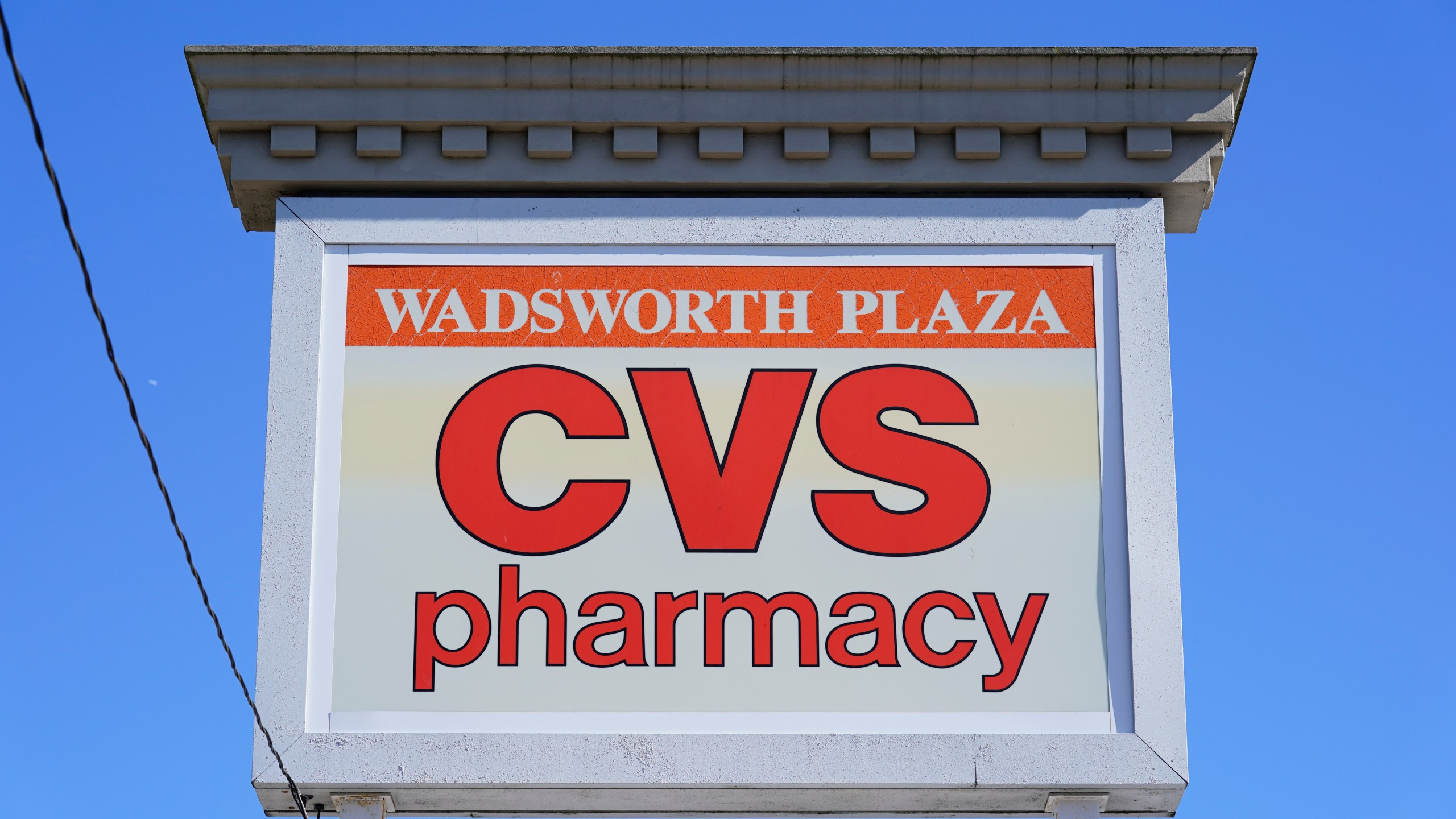 FILE - This Sept. 29, 2021 photo shows a sign for the CVS in Wadsworth Plaza in Philadelphia. CVS Health reports earnings on Wednesday, Feb. 7, 2024. (AP Photo/Matt Rourke, File)