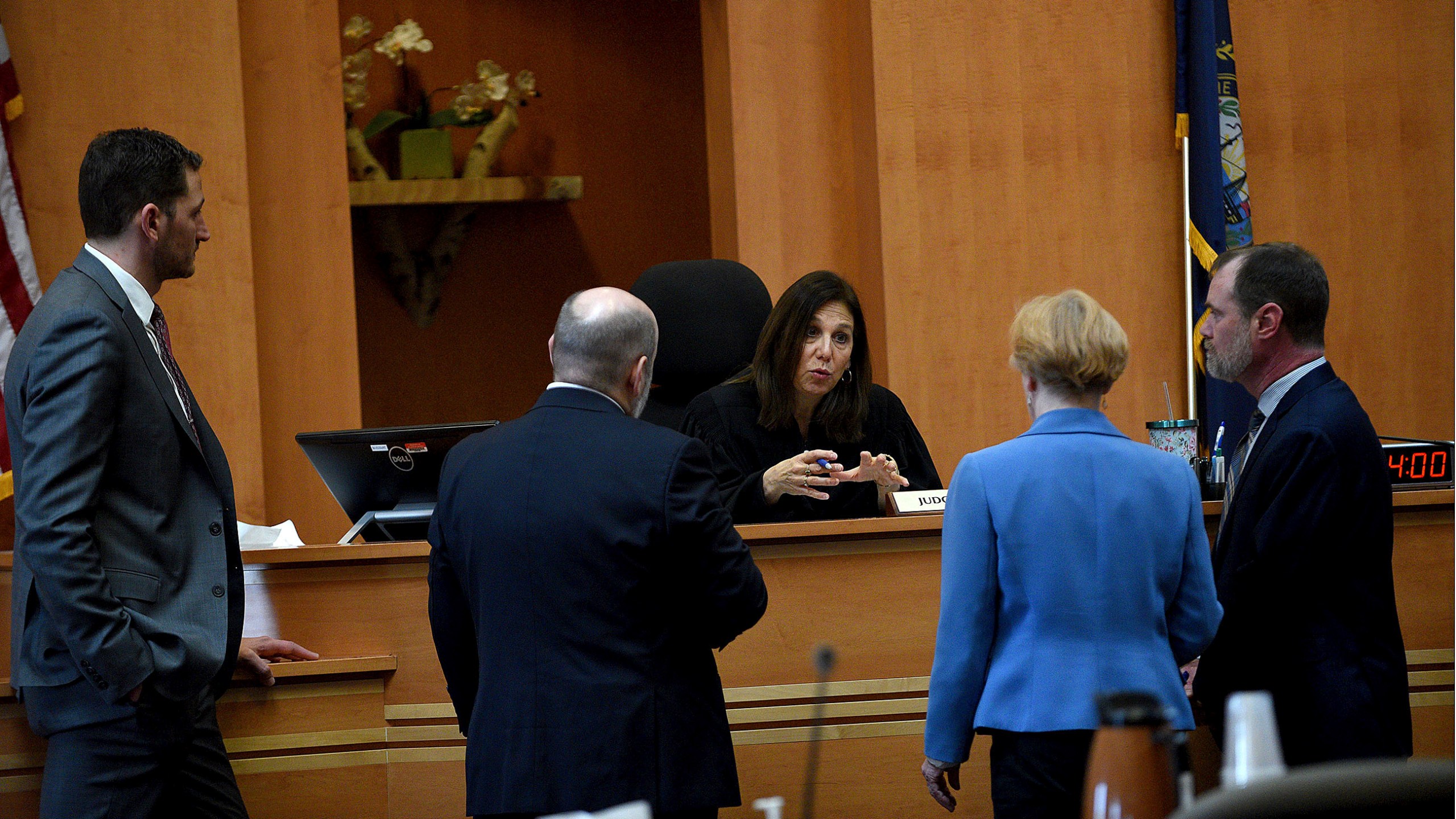 Superior Court Justice Amy Messer conducts a bench meeting with lawyers at jury selection for the Adam Montgomery murder trial at Hillsborough County Superior Court in Manchester, N.H, on Tuesday, Feb. 6, 2024. Montgomery is accused of killing his 5-year-old daughter and spending months moving her body before disposing of it. (David Lane/Union Leader via AP, Pool)