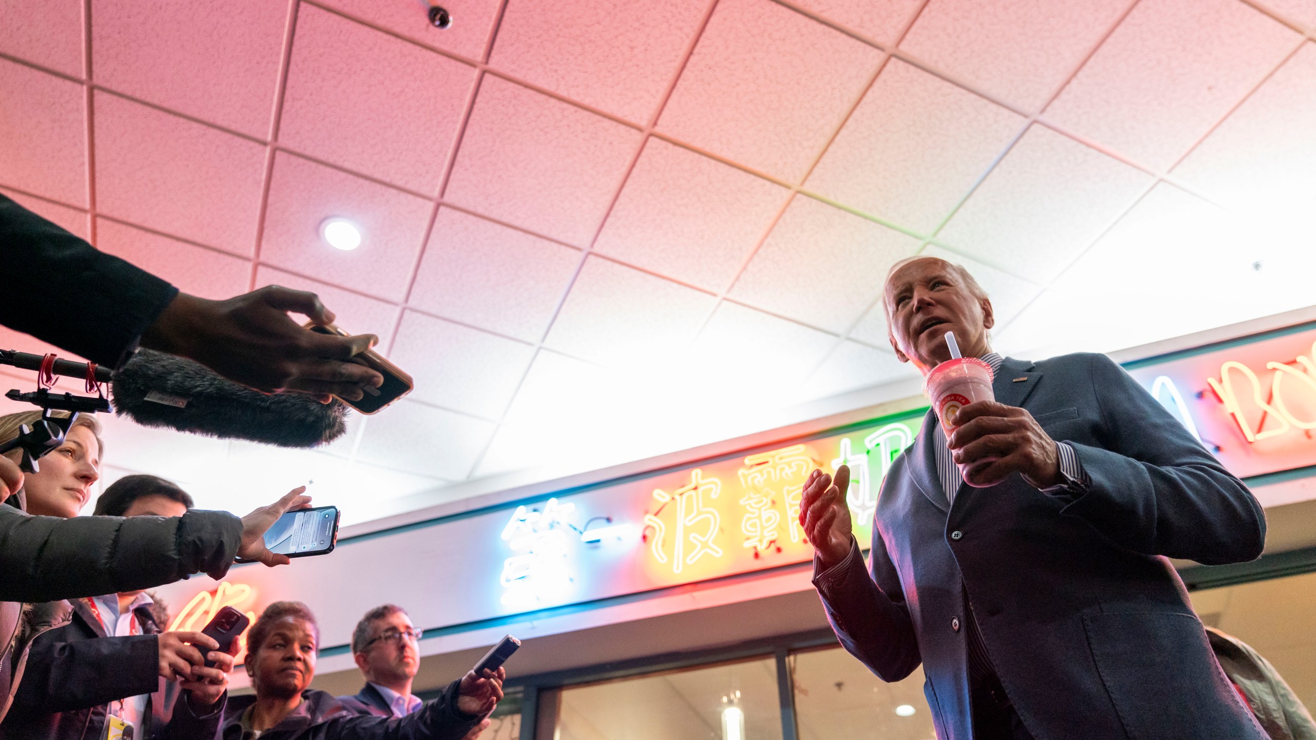 President Joe Biden talks to reporters after visiting No. 1 Boba Tea in Las Vegas, Monday, Feb. 5, 2024. (AP Photo/Stephanie Scarbrough)