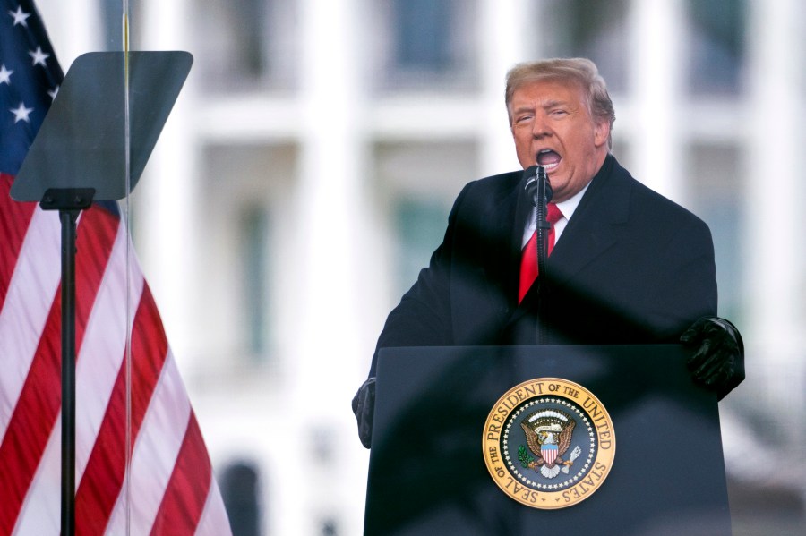 FILE - Then-President Donald Trump speaks during a rally protesting the Elector College certification of Joe Biden's win in the 2020 presidential race, in Washington on Jan. 6, 2021. The fate of former President Donald Trump’s attempt to return to the White House is in the U.S. Supreme Court’s hands. On Thursday, the justices will hear arguments in Trump’s appeal of a Colorado Supreme Court ruling that he is not eligible to run again for president because he violated a provision in the 14th Amendment preventing those who “engaged in insurrection” from holding office. (AP Photo/Evan Vucci, File)