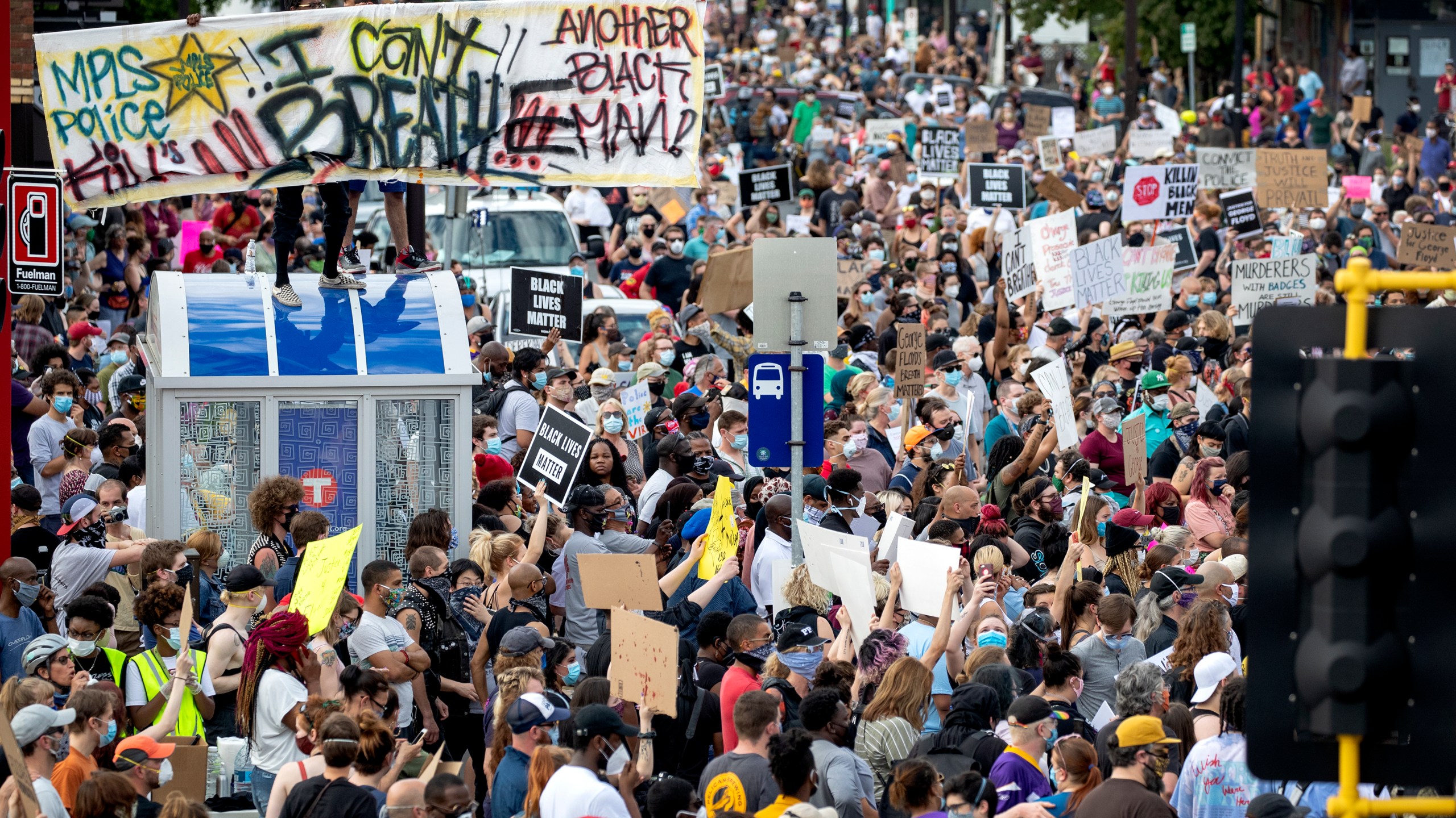 FILE - Protesters gather calling for justice for George Floyd, May 26, 2020, in Minneapolis. The city of Minneapolis agreed Thursday, Feb. 8, 2024, to pay $950,000 to settle a lawsuit alleging that journalists were subjected to police harassment and even hurt while covering protests over the police killings of Floyd. (Carlos Gonzalez/Star Tribune via AP, File)