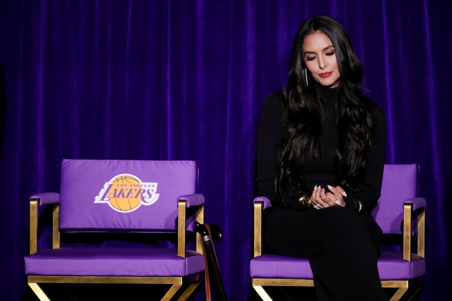 Vanessa Bryant, widow of Kobe Bryant, sits on a chair during the unveiling of a statue of Kobe Bryan outside the NBA basketball team's arena, Thursday, Feb. 8, 2024, in Los Angeles. (AP Photo/Eric Thayer)