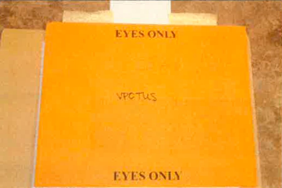 This image, contained in the report from special counsel Robert Hur, shows the envelope labeled "Eyes Only" with a handwritten note reading "VPOTUS," that contained classified documents that were found in Box 3 of documents housed at the Penn Biden Center in Washington. (Justice Department via AP)