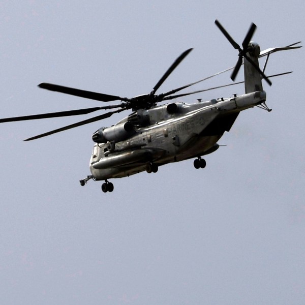 A Marine CH-53E Super Stallion helicopter flies during training at Marine Corps Air Station Miramar in San Diego, Tuesday, Feb. 6, 2024. A Marine Corps helicopter, like the one pictured, that had been missing with five troops aboard as an historic storm continued drenching California was found Wednesday morning, Feb. 7, 2024, in a mountainous area outside San Diego.(K.C. Alfred/The San Diego Union-Tribune via AP)