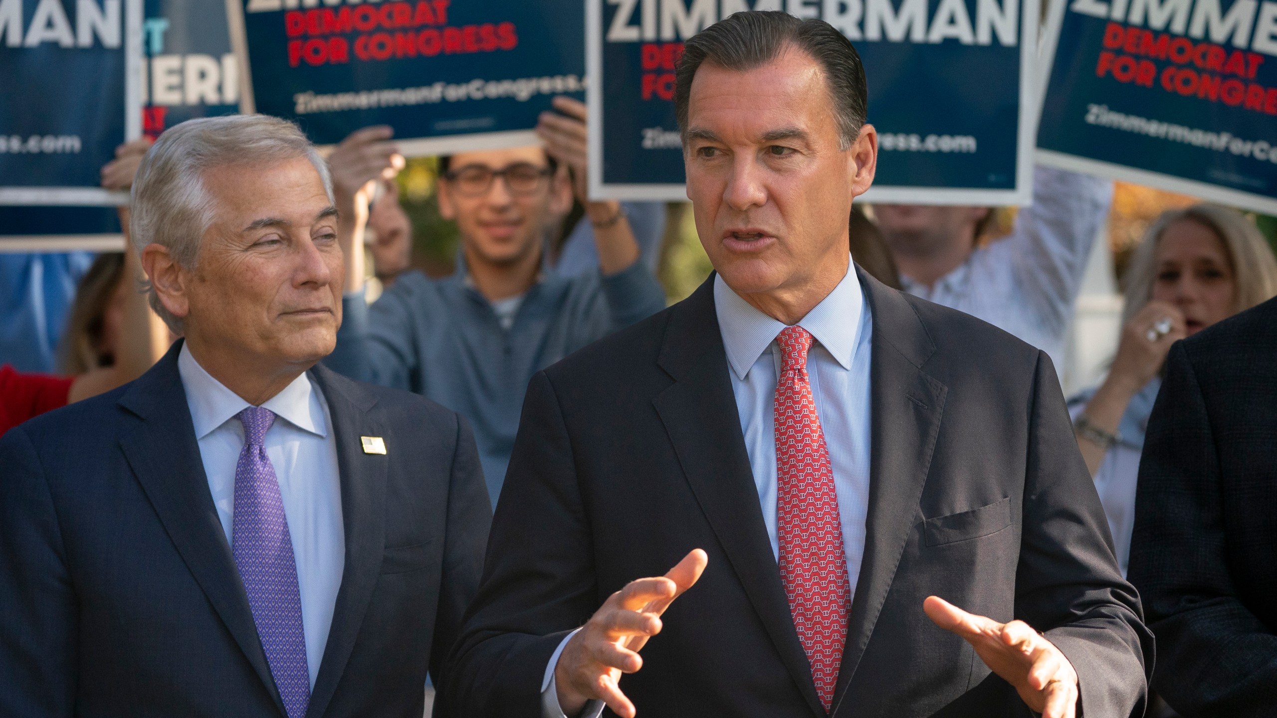 FILE - Rep. Tom Suozzi, D-N.Y., right, speaks alongside Robert Zimmerman, Democratic candidate for New York's 3rd Congressional District, during a news conference, Monday, Nov. 7, 2022, in Great Neck, N.Y. The Tuesday contest for New York's District 3 House seat held by George Santos until his recent expulsion is shaping up to be a bellwether in the fight for control of Congress, with Suozzi pitted against GOP candidate Mazi Pilip. (AP Photo/John Minchillo, File)