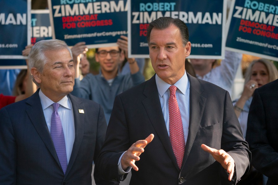 FILE - Rep. Tom Suozzi, D-N.Y., right, speaks alongside Robert Zimmerman, Democratic candidate for New York's 3rd Congressional District, during a news conference, Monday, Nov. 7, 2022, in Great Neck, N.Y. The Tuesday contest for New York's District 3 House seat held by George Santos until his recent expulsion is shaping up to be a bellwether in the fight for control of Congress, with Suozzi pitted against GOP candidate Mazi Pilip. (AP Photo/John Minchillo, File)