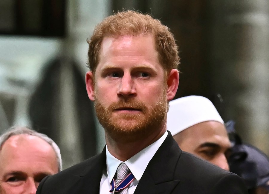 FILE - Britain's Prince Harry, Duke of Sussex looks on as Britain's King Charles III leaves Westminster Abbey after coronation in central London Saturday, May 6, 2023. Prince Harry has spoken to King Charles III about his cancer diagnosis and “will be traveling to the U.K. to see His Majesty in the coming days,” said the office of Harry and his wife, Meghan. (Ben Stansall/Pool photo via AP, File)