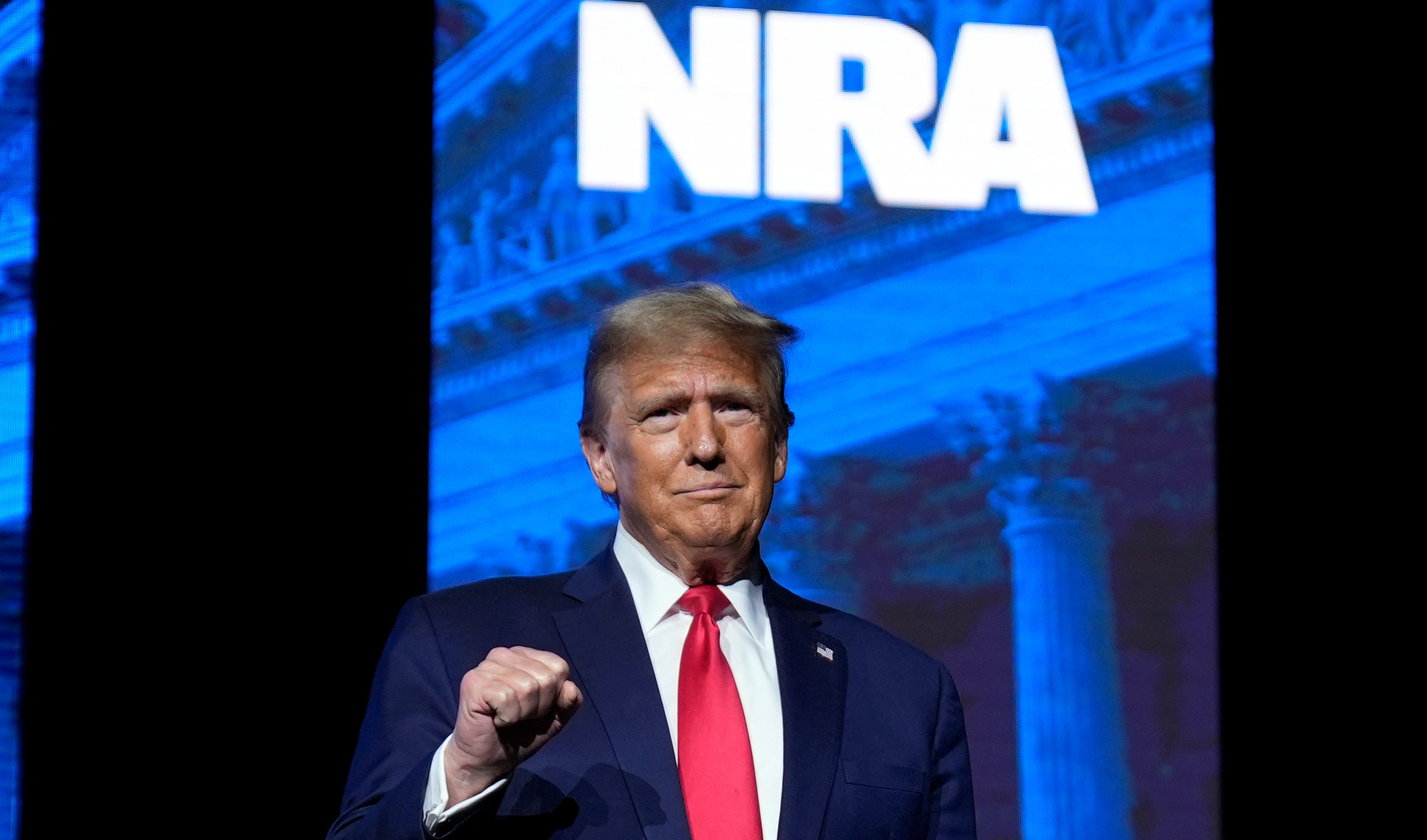 Republican presidential candidate former President Donald Trump arrives to speak at the National Rifle Association's Presidential Forum in Harrisburg, Pa., Friday, Feb. 9, 2024. (AP Photo/Matt Rourke)