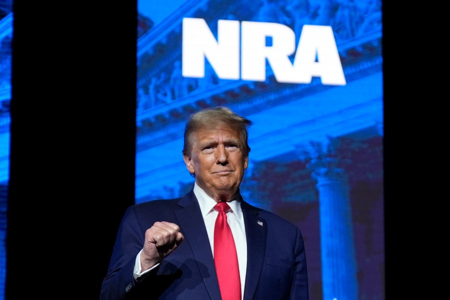 Republican presidential candidate former President Donald Trump arrives to speak at the National Rifle Association's Presidential Forum in Harrisburg, Pa., Friday, Feb. 9, 2024. (AP Photo/Matt Rourke)