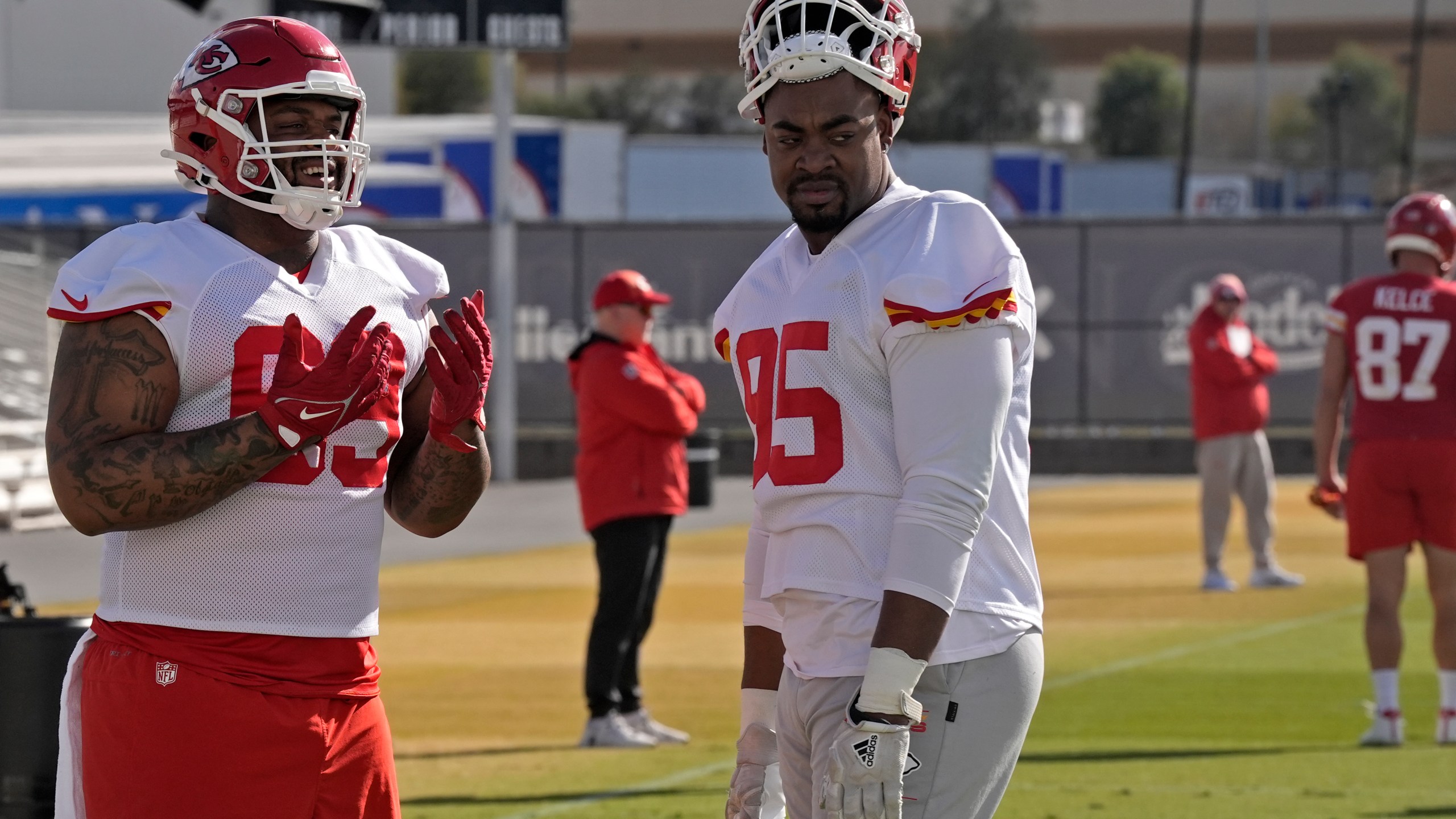 Kansas City Chiefs defensive tackle Mike Pennel Jr., left, and Kansas City Chiefs defensive tackle Chris Jones (95) talk during practice for Super Bowl 58 Thursday, Feb. 8, 2024 in Henderson, Nev. The Chiefs will play the NFL football game against the San Francisco 49ers Sunday in Las Vegas. (AP Photo/Charlie Riedel)