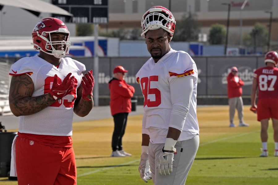 Kansas City Chiefs defensive tackle Mike Pennel Jr., left, and Kansas City Chiefs defensive tackle Chris Jones (95) talk during practice for Super Bowl 58 Thursday, Feb. 8, 2024 in Henderson, Nev. The Chiefs will play the NFL football game against the San Francisco 49ers Sunday in Las Vegas. (AP Photo/Charlie Riedel)