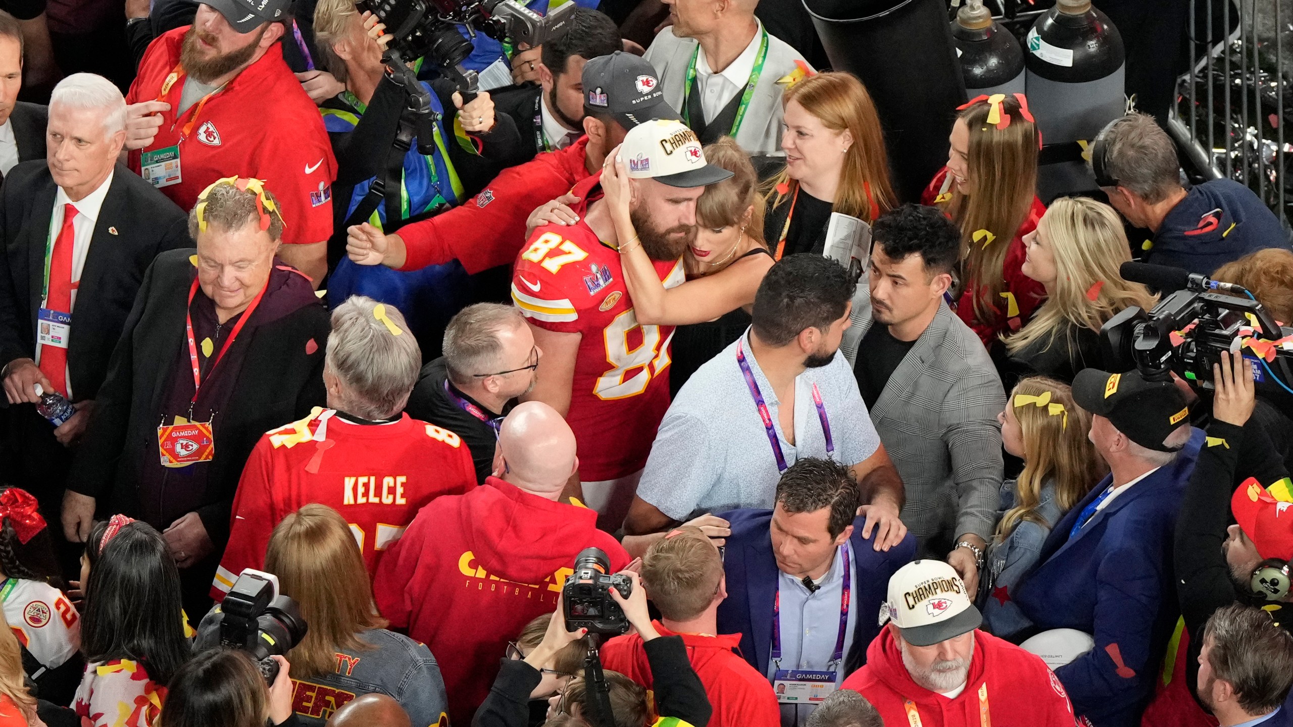 Kansas City Chiefs tight end Travis Kelce (87) hugs his girlfriend Taylor Swift after the team's victory over the San Francisco 49ers during the NFL Super Bowl 58 football game Sunday, Feb. 11, 2024, in Las Vegas. (AP Photo/David J. Phillip)