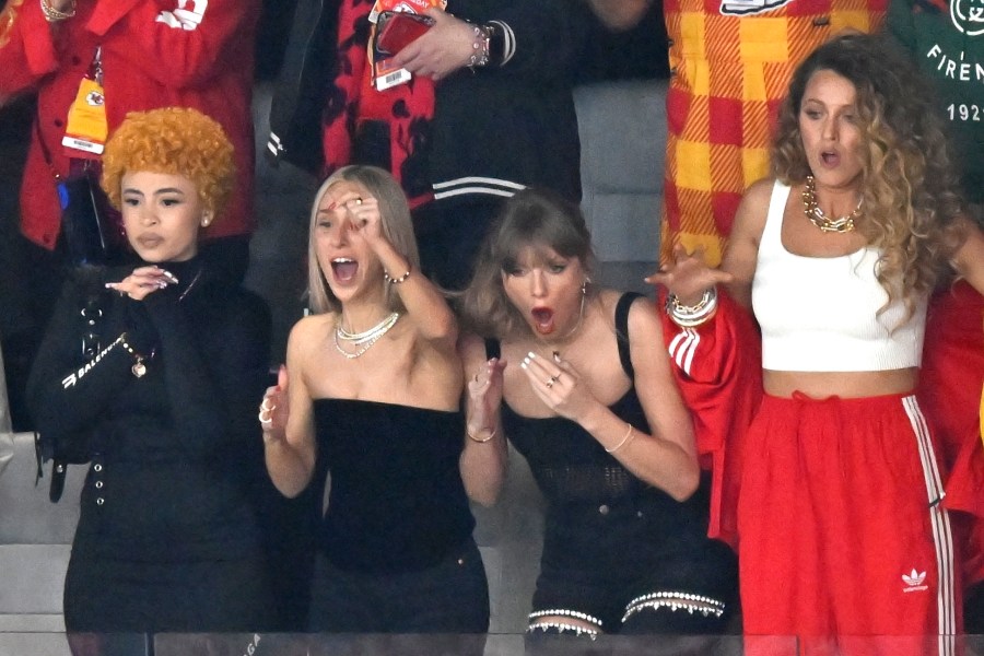 Ice Spice, from left, Ashley Avignone Taylor Swift and Blake Lively react during the first half of the NFL Super Bowl 58 football game between the San Francisco 49ers and the Kansas City Chiefs on Sunday, Feb. 11, 2024, in Las Vegas. (AP Photo/David Becker)