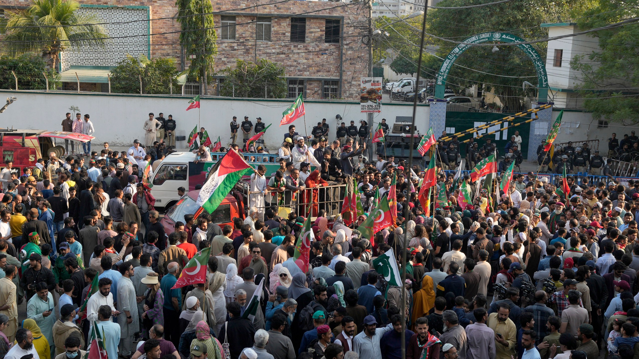Supporters of Pakistan's Former Prime Minister Imran Khan's party 'Pakistan Tehreek-e-Insaf' hold a protest against alleged vote-rigging in some constituencies in the parliamentary elections, in Karachi, Pakistan, Sunday, Feb. 11, 2024. (AP Photo/Fareed Khan)