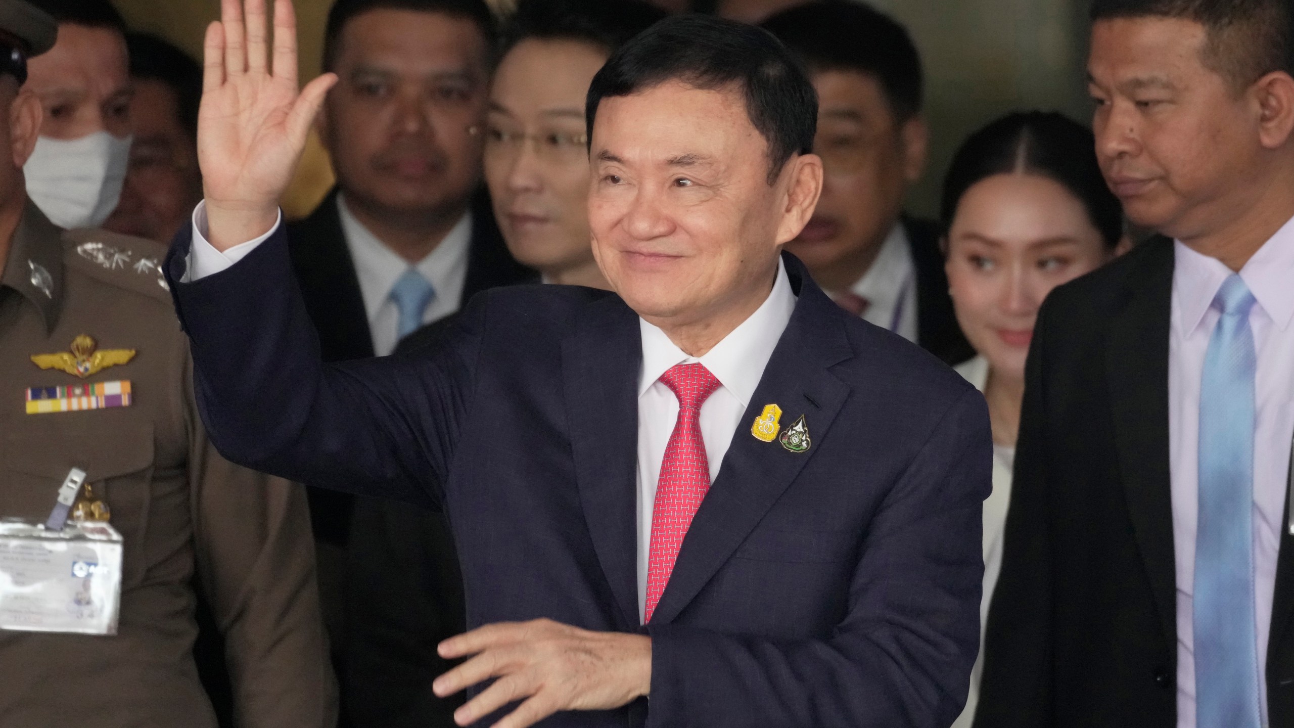 FILE - Former Prime Minister Thaksin Shinawatra, arrive Don Muang airport in Bangkok, Thailand, on Aug. 22, 2023. Thaksin, who last year returned from more than a decade of self-imposed exile to serve a prison sentence for misdeeds committed while in office, has been granted parole and could be released this weekend, the country’s justice minister announced Tuesday, Feb. 13, 2024. (AP Photo/Sakchai Lalit, File)
