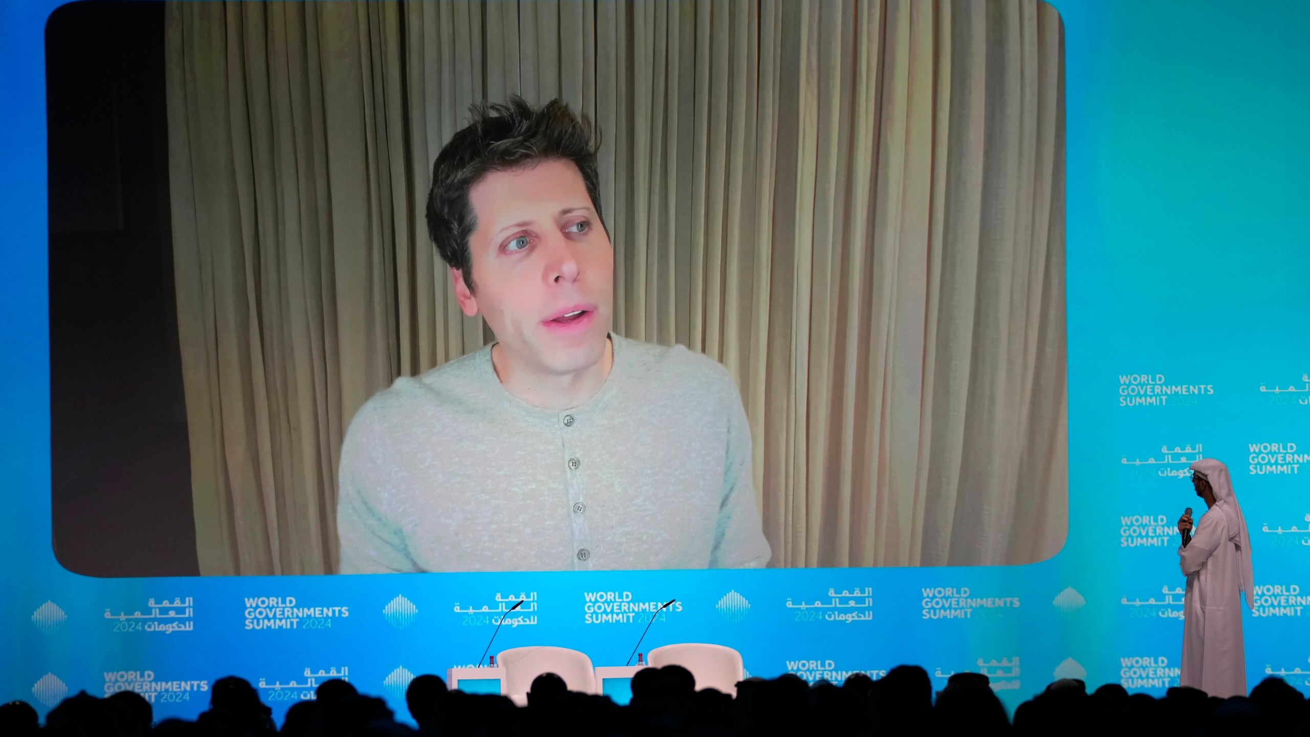 OpenAI CEO Sam Altman talks on a video chat during the World Government Summit in Dubai, United Arab Emirates, Tuesday, Feb. 13, 2024. The CEO of ChatGPT maker OpenAI said Tuesday that the danger that keeps him awake at night regarding artificial intelligence are the "very subtle societal misalignments" that can make the systems wreck havoc. (AP Photo/Kamran Jebreili)