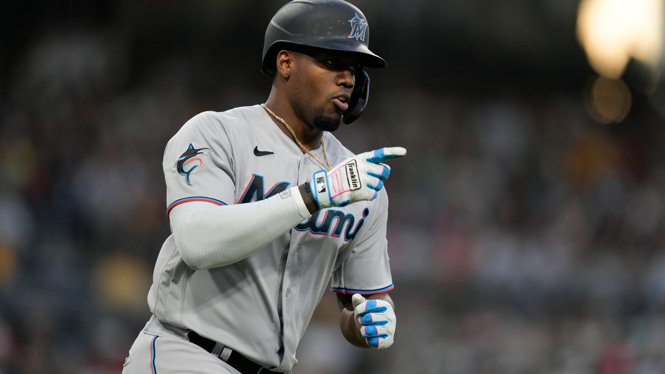 FILE - Miami Marlins' Jorge Soler celebrates after hitting a home run during the third inning of a baseball game against the San Diego Padres, Tuesday, Aug. 22, 2023, in San Diego. Free agent outfielder Jorge Soler has agreed to a $42 million, three-year contract with the San Francisco Giants, according to a person with direct knowledge of the negotiations. (AP Photo/Gregory Bull, File)