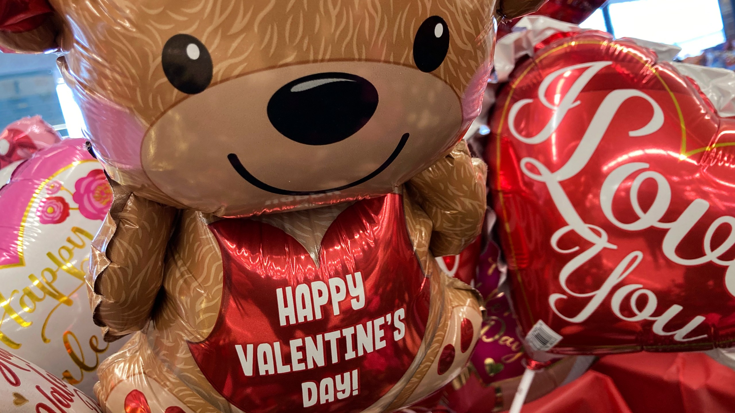 FILE - Valentine's Day balloons are displayed at a grocery store in Buffalo Grove, Ill., Feb. 10, 2022. In 2024, Feb. 14 is a holiday heavyweight due to a calendar collision of events — it’s Valentine’s Day and Ash Wednesday. (AP Photo/Nam Y. Huh, File)