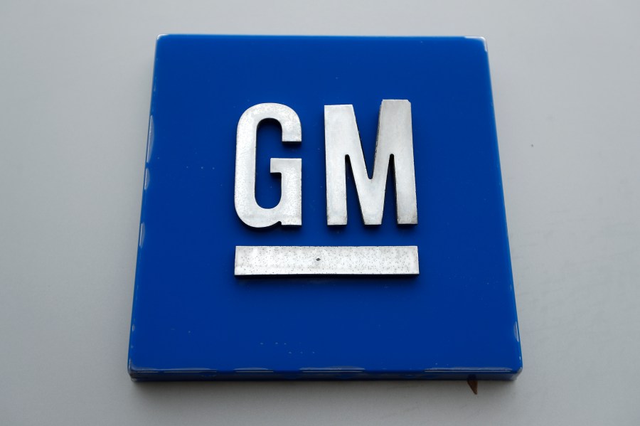 FILE - A General Motors logo is displayed outside the General Motors Detroit-Hamtramck Assembly plant on Jan. 27, 2020, in Hamtramck, Mich. General Motors is adding about 350,000 miles (563,000 kilometers) of roadways in the U.S and Canada to the area where drivers can use the company's “Super Cruise” partially automated driving system. (AP Photo/Paul Sancya, File)