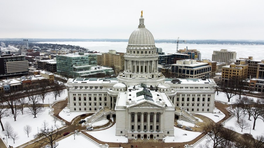 FILE - This image taken with a drone shows the Wisconsin State Capitol on Dec. 31, 2020, in Madison, Wis. Wisconsin lawmakers were set to vote Thursday, Feb. 15, 2024 on proposals to regulate artificial intelligence, joining a growing number of states grappling with how to control the technology as November's elections loom. (AP Photo/Morry Gash, file)