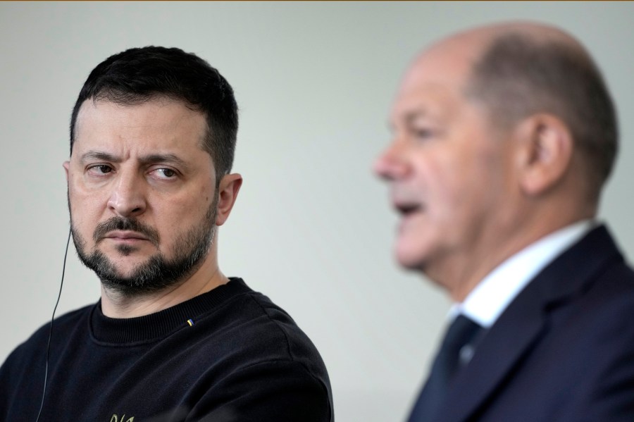 German Chancellor Olaf Scholz, right, and Ukrainian President Volodymyr Zelenskyy attend a press conference in the chancellory in Berlin, Friday, Feb.16, 2024. (AP Photo/Markus Schreiber)