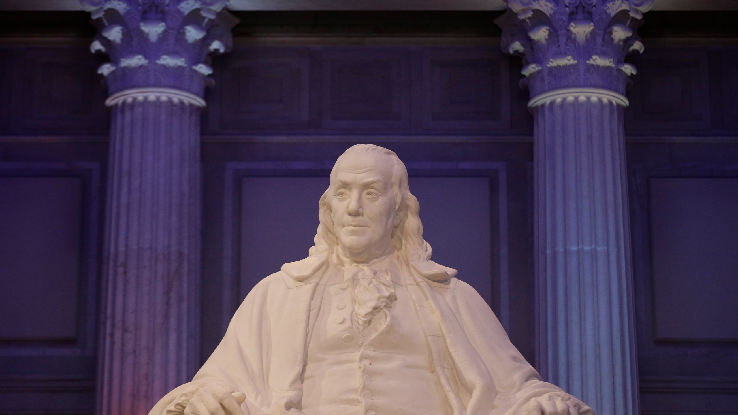 FILE - A statue of Benjamin Franklin is seen at The Franklin Institute, Tuesday, Feb. 10, 2015, in Philadelphia. Franklin, like some other key founders, admired Jesus as a moral teacher but would not pass a test of Christian orthodoxy. (AP Photo/Matt Rourke, File)