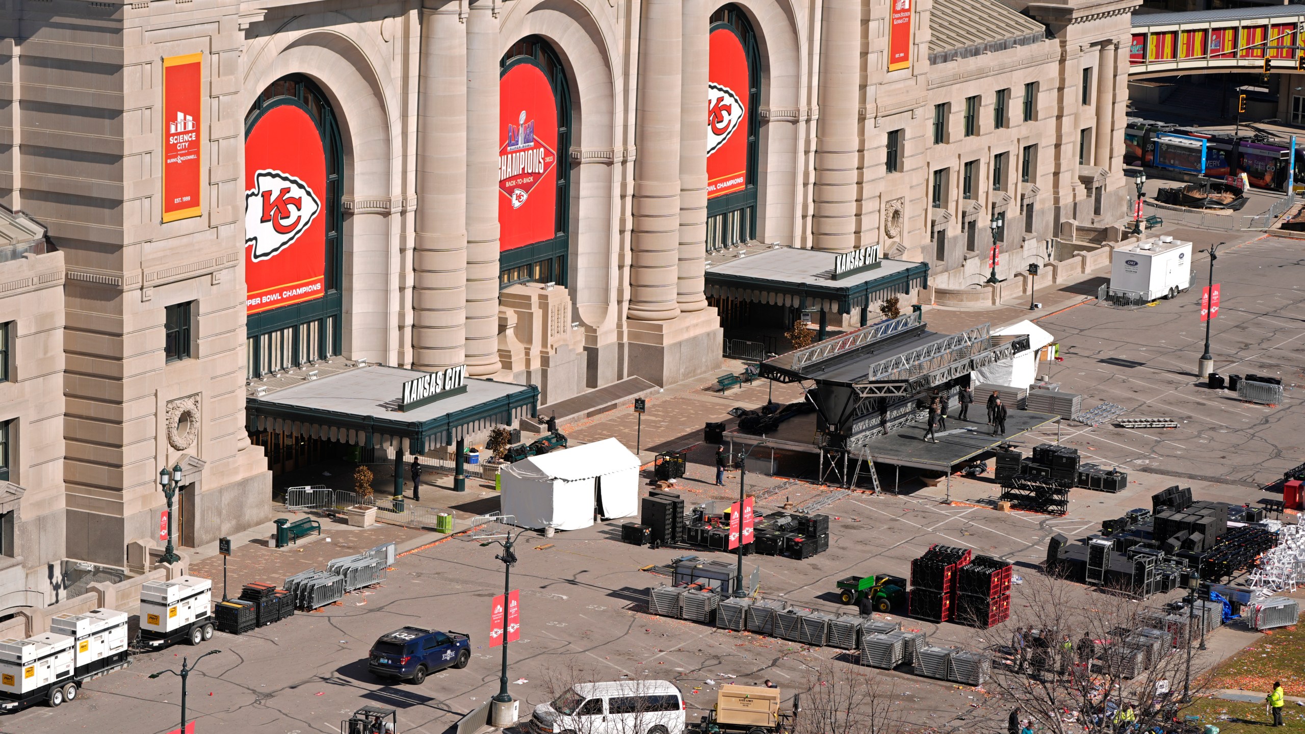 Workers dismantle the stage outside of Union Station Thursday, Feb. 15, 2024, in Kansas City, Mo. The venue was the site of a mass shooting Wednesday after a rally celebrating the Kansas City Chiefs winning the NFL Super Bowl 58 football game. (AP Photo/Charlie Riedel)