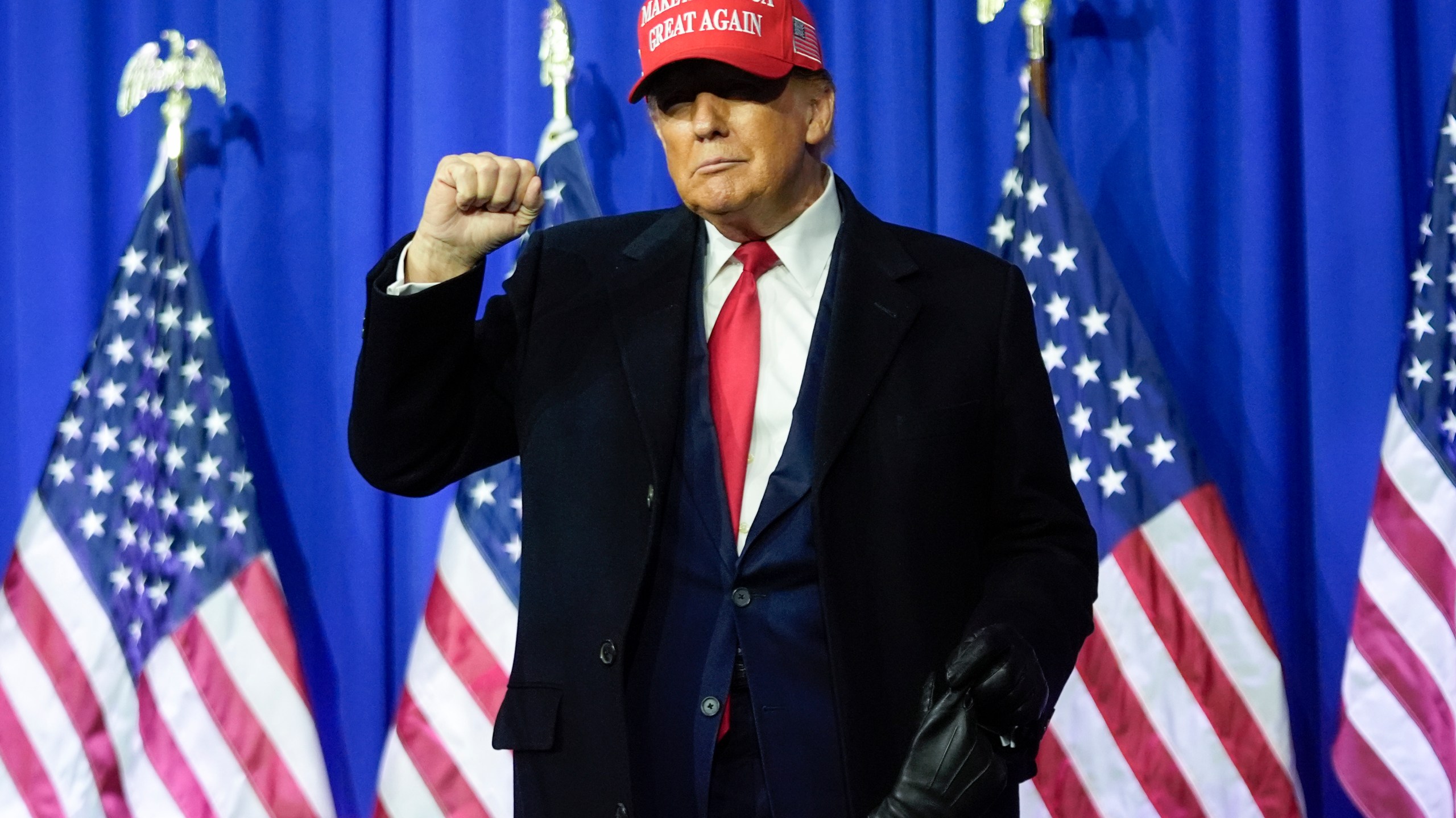 Republican presidential candidate former President Donald Trump gestures at a campaign rally in Waterford Township, Mich., Saturday, Feb. 17, 2024. (AP Photo/Paul Sancya)