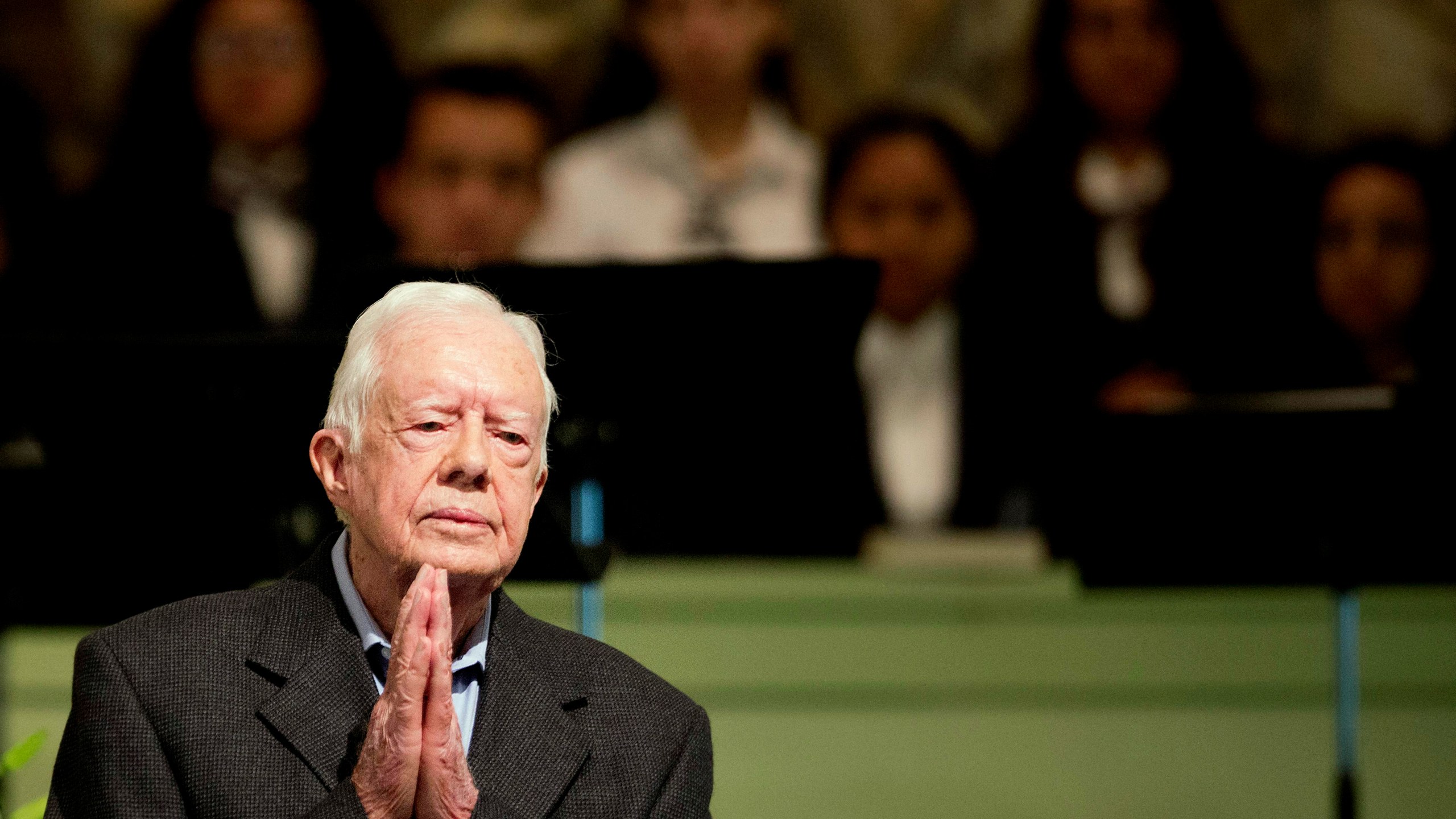 FILE - Former President Jimmy Carter teaches Sunday School class at Maranatha Baptist Church in his hometown, Aug. 23, 2015, in Plains, Ga. In the year since Jimmy Carter first entered home hospice care, the 39th president has celebrated his 99th birthday, enjoyed tributes to his legacy and outlived his wife of 77 years. Rosalynn Carter, who died in November 2023 after suffering from dementia, spent just a few days under hospice. (AP Photo/David Goldman, File)