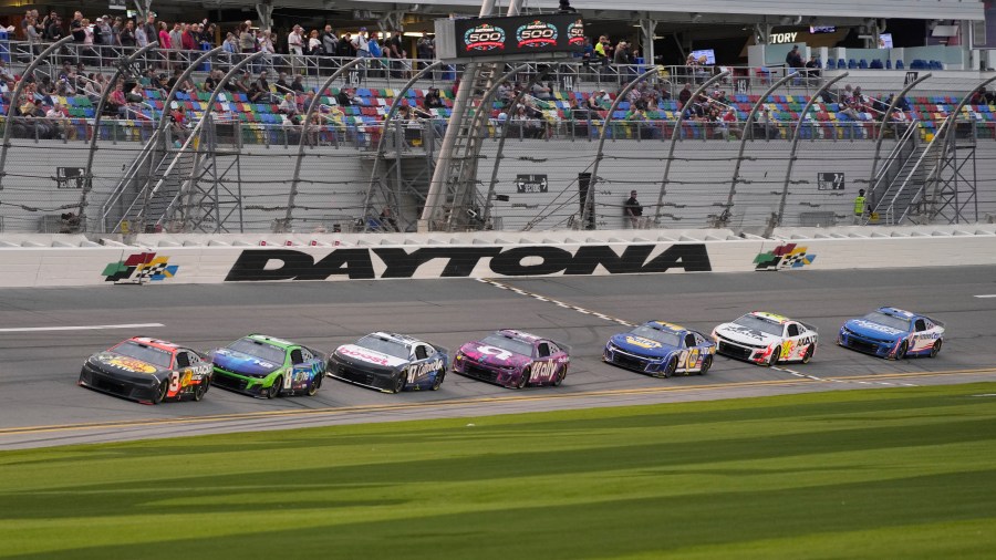 A group of drivers led by Austin Dillon (3) runs laps during a practice session for the NASCAR Daytona 500 auto race at Daytona International Speedway, Friday, Feb. 16, 2024, in Daytona Beach, Fla. (AP Photo/John Raoux)