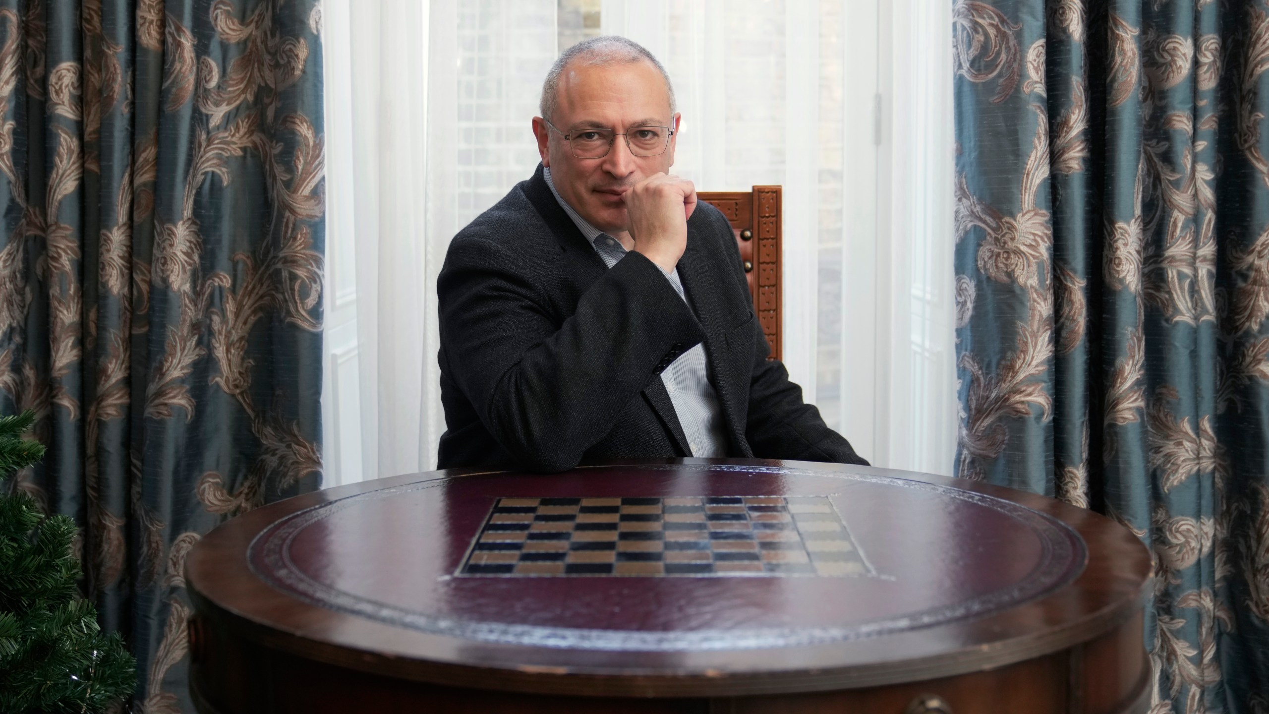 Exiled Russian businessman and opposition figure Mikhail Khodorkovsky, poses during an interview in London, Tuesday, Jan. 16, 2024. Khodorkovsky, who now lives in London, is one of several Russian opposition politicians trying to build a coalition with grassroots anti-war groups across the world and exiled Russian opposition figures. They include Russian chess legend Garry Kasparov, Mikhail Kasyanov, a former Russian prime minister and Vladimir Kara-Murza Jr. who is currently serving a 25 year prison sentence in Russia for treason after criticizing Russia’s war in Ukraine. (AP Photo/Kin Cheung)