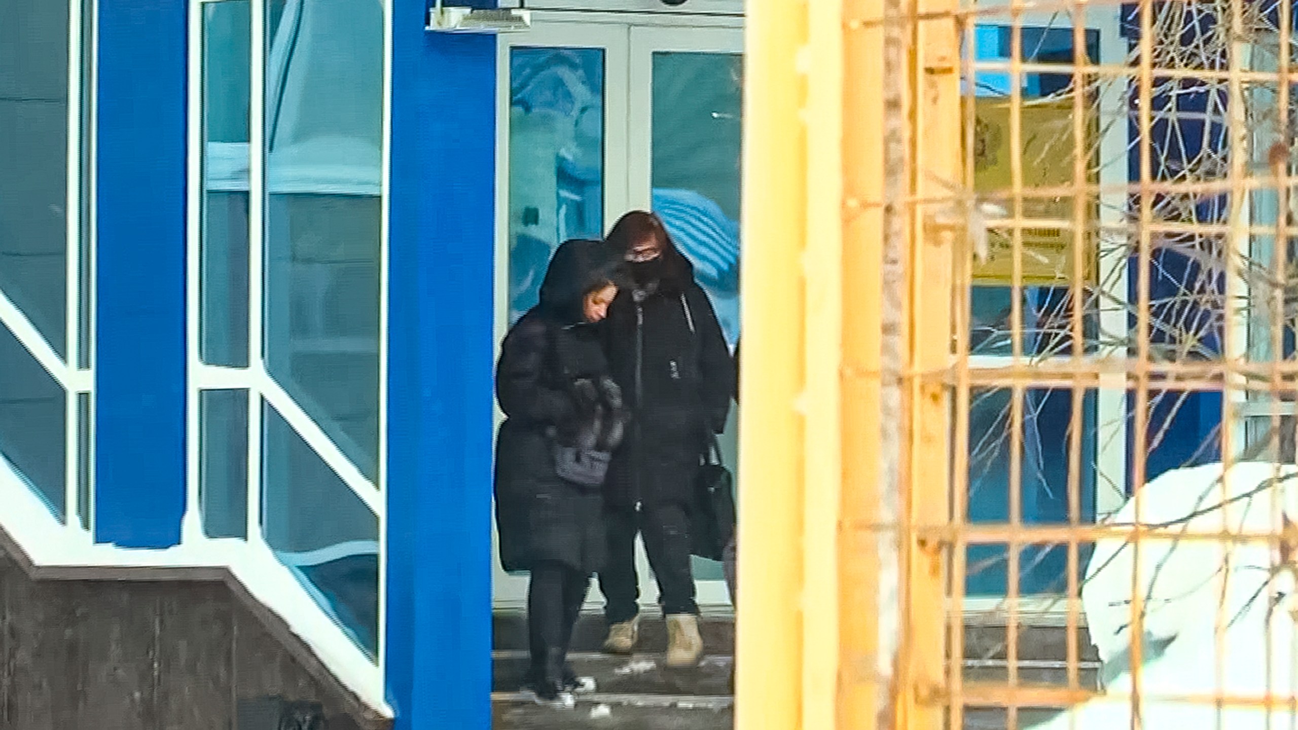 In this grab taken from video, Lyudmila Navalnaya, mother of Russian opposition leader Alexei Navalny, right, leaves the building of the Investigative Committee, regional department in Yamal-Nenets region in Salekhard, 1937 km (1211 miles) northeast of Moscow, Russia, Monday, Feb. 19, 2024. Russians across the vast country streamed to ad-hoc memorials with flowers and candles to pay tribute to Alexei Navalny, the most famous Russian opposition leader and the Kremlin's fiercest critic. Russian officials reported that Navalny, 47, died in prison on Friday. (AP Photo)