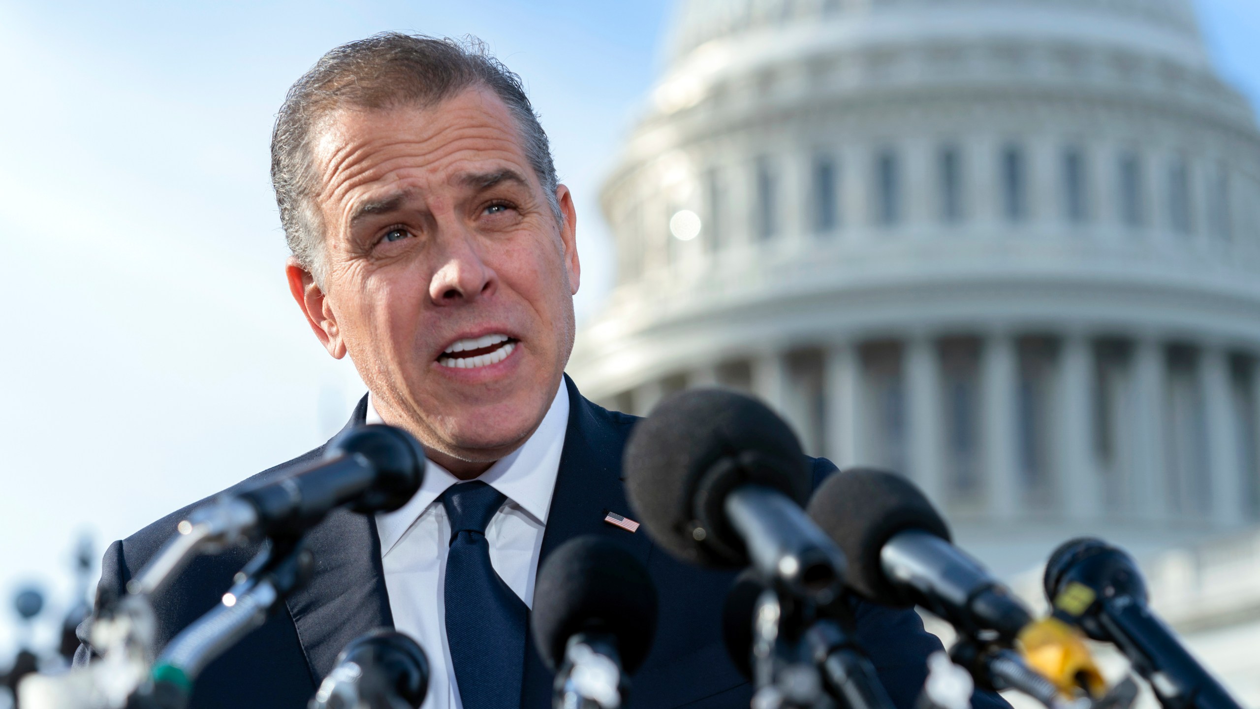 Hunter Biden, son of U.S. President Joe Biden, talks to reporters at the U.S. Capitol, in Washington, Dec. 13, 2023. Prosecutors say a former FBI informant charged with making up a multimillion-dollar bribery scheme involving President Joe Biden, his son Hunter and a Ukrainian energy company had contacts with officials affiliated with Russian intelligence.(AP Photo/Jose Luis Magana, File)