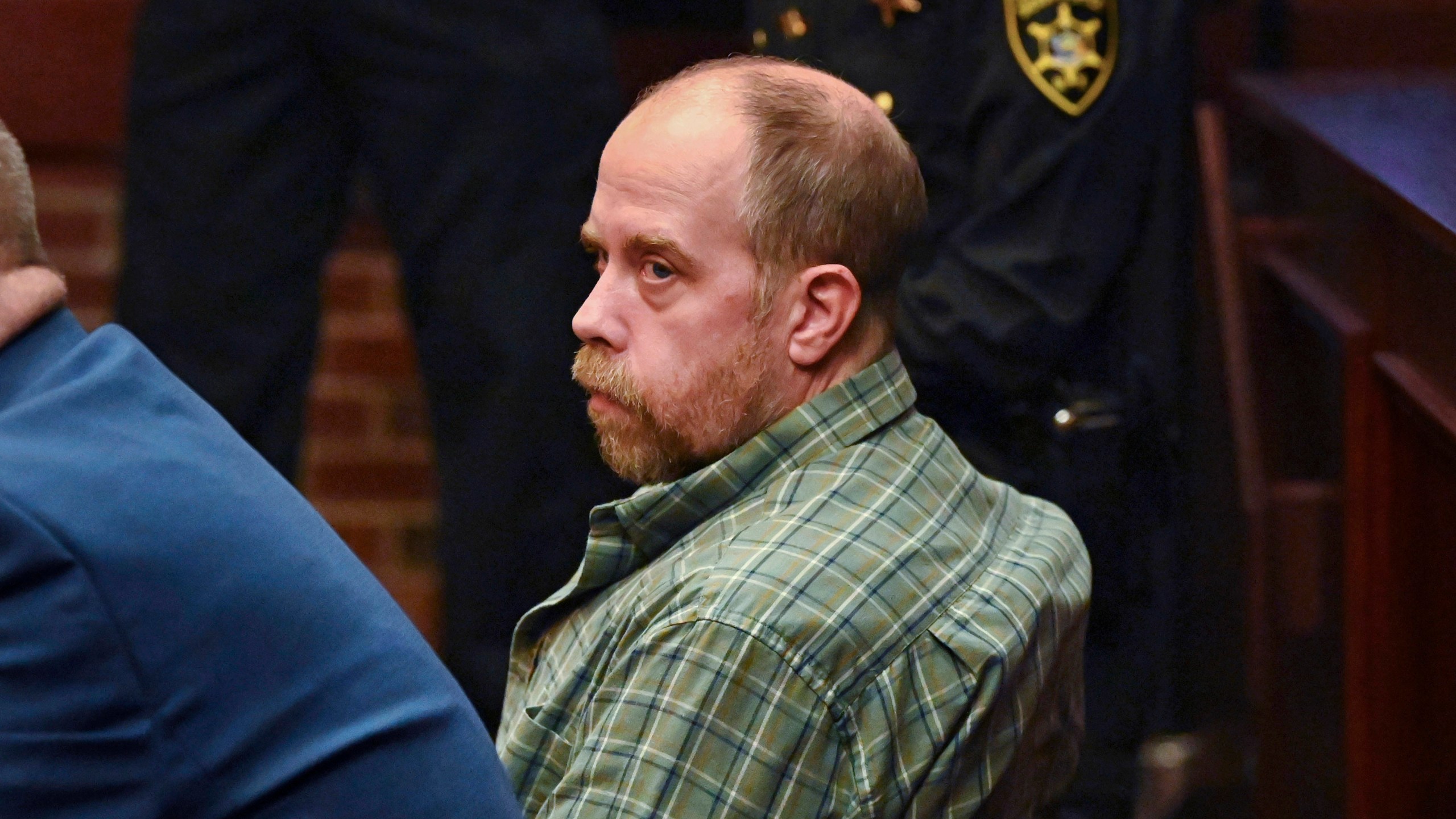 FILE — Craig N. Ross, Jr. is arraigned before Judge James A. Murphy III on charges related to the kidnapping of a 9-year-old from Moreau Lake State Park Friday, Nov. 17, 2023, at Saratoga County Court in Ballston Spa, NY. Ross pleaded guilty, Wednesday, Feb. 21, 2024, to two felony counts and faces 47 years to life in prison. (Will Waldron/The Albany Times Union via AP, File)