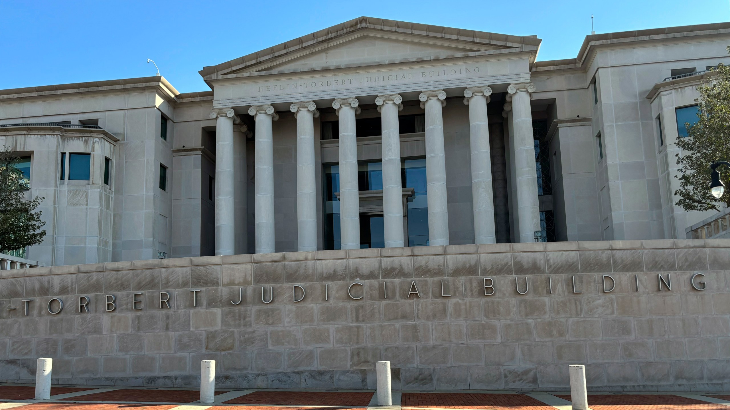 The exterior of the Alabama Supreme Court building in Montgomery, Ala., is shown Tuesday, Feb. 20, 2024. The Alabama Supreme Court ruled, Friday, Feb. 16, 2024, that frozen embryos can be considered children under state law, a ruling critics said could have sweeping implications for fertility treatments. The decision was issued in a pair of wrongful death cases brought by three couples who had frozen embryos destroyed in an accident at a fertility clinic. (AP Photo/Kim Chandler)