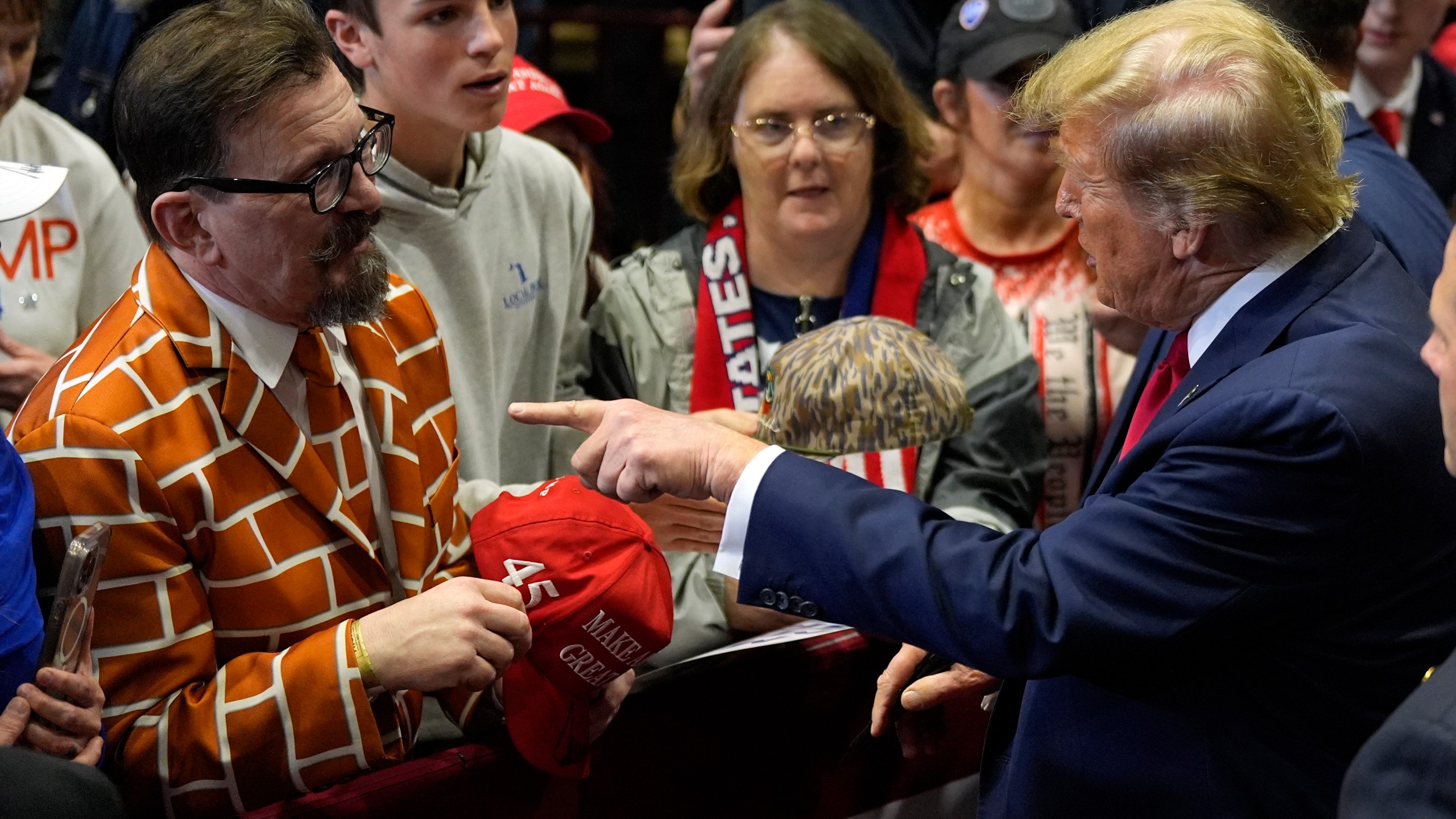 Republican presidential candidate former President Donald Trump greets a supporter at a campaign rally Friday, Feb. 23, 2024, in Rock Hill, S.C. (AP Photo/Chris Carlson)