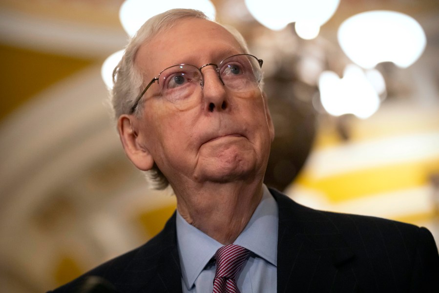 Senate Minority Leader Mitch McConnell of Ky., listens to a reporter's question during a press availability on Capitol Hill, Tuesday, Feb. 27, 2024, in Washington. President Joe Biden implored the top four leaders of Congress to act quickly to avoid a looming government shutdown early next month and to pass emergency aid for Ukraine and Israel, as a legislative logjam in the GOP-led House showed no signs of abating. (AP Photo/Mark Schiefelbein)