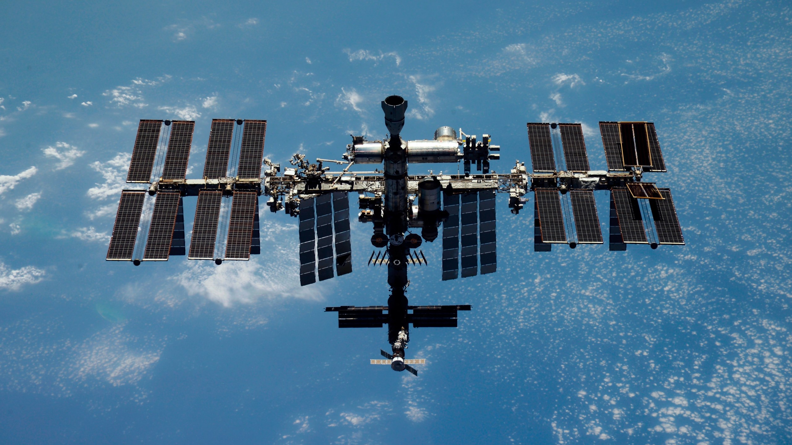 FILE - This undated photo released by the Roscosmos State Space Corporation shows the International Space Station (ISS). Russia's Roscosmos state corporation on Wednesday reported an air leak in the Russian segment of the International Space Station, but said it posed no threat to its crew. (Roscosmos State Space Corporation via AP, File)