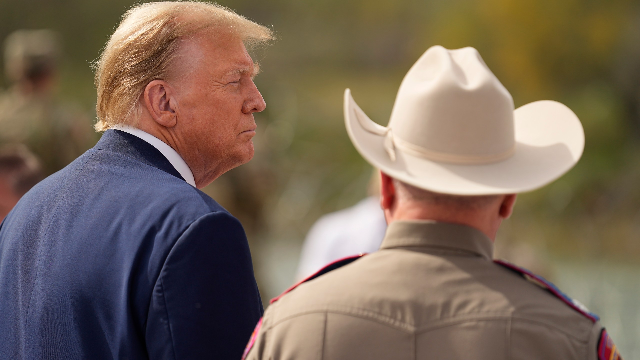 Republican presidential candidate former President Donald Trump listens as he visits the boat ramp at Shelby Park during a visit to the U.S.-Mexico border, Thursday, Feb. 29, 2024, in Eagle Pass, Texas. (AP Photo/Eric Gay)