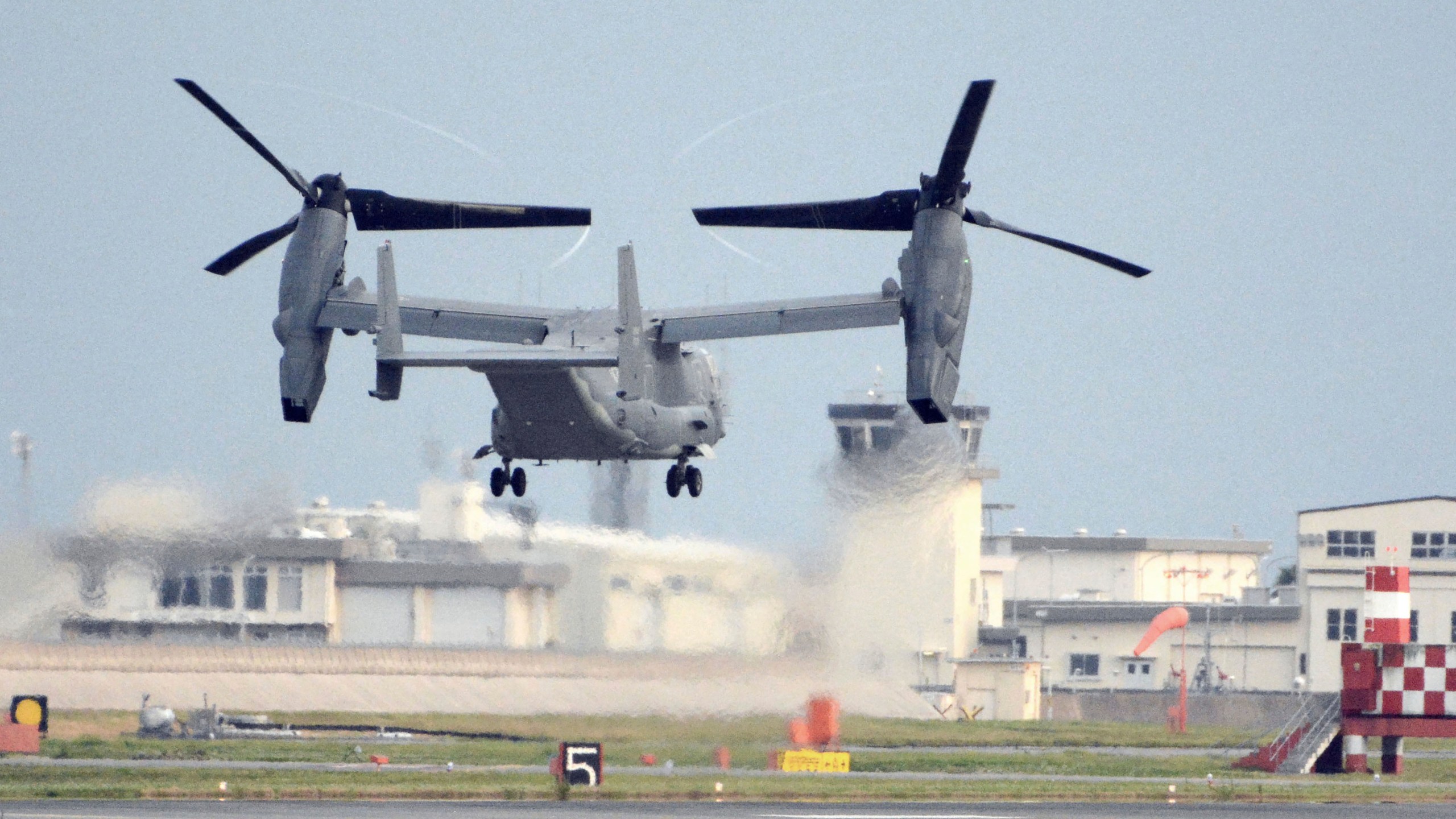 FILE - A U.S. military CV-22 Osprey takes off from Iwakuni base, Yamaguchi prefecture, western Japan, on July 4, 2018. Air Force Special Operations Command said Tuesday it knows what failed on its CV-22B Osprey leading to a November crash in Japan that killed eight service members. But it still does not know why the failure happened. Because of the crash almost the entire Osprey fleet, hundreds of aircraft across the Air Force, Marine Corps and Navy, has been grounded since Dec. 6. (Kyodo News via AP, File)