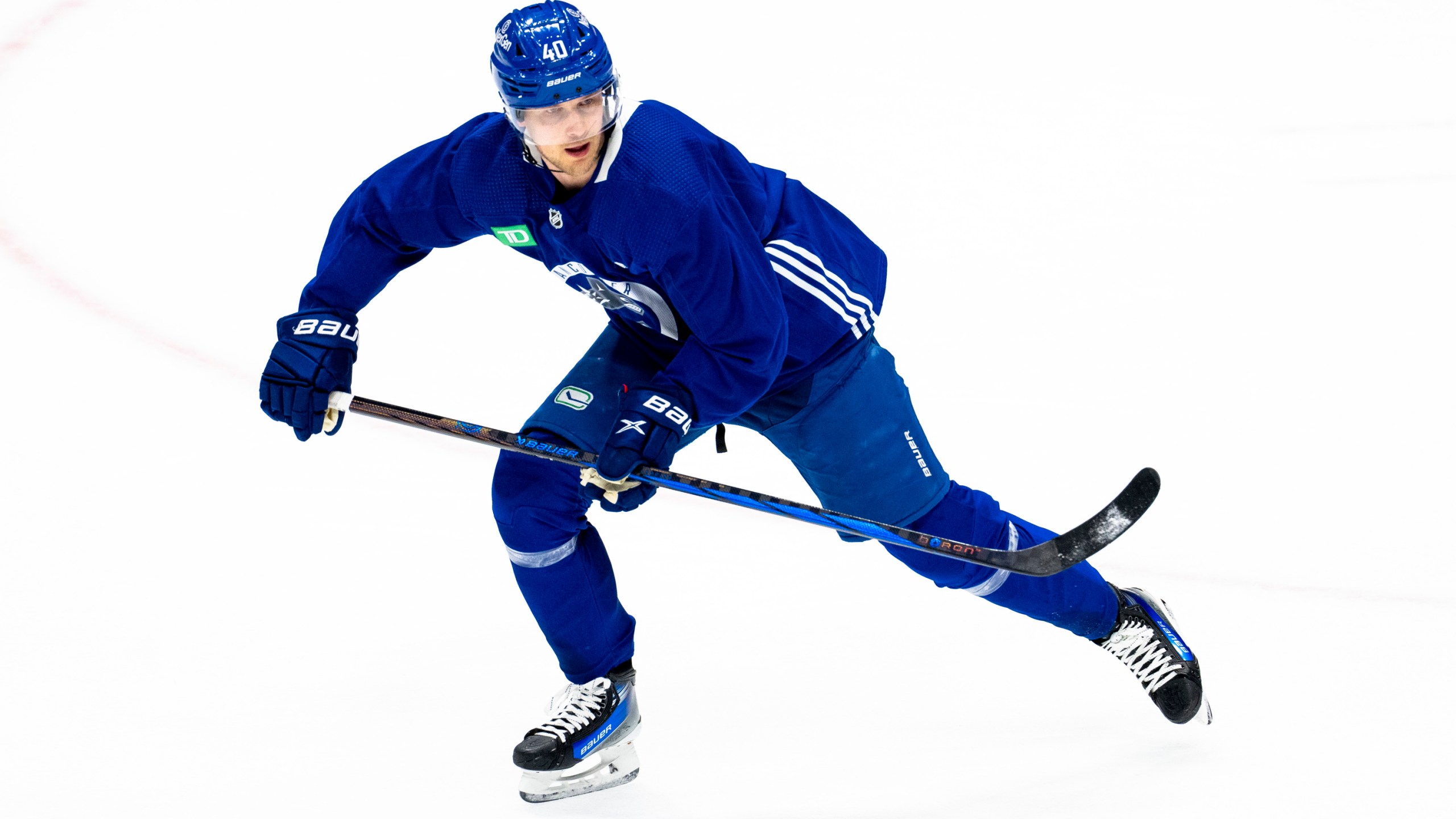 Vancouver Canucks' Elias Pettersson skates during an NHL hockey practice in Vancouver, British Columbia on Saturday, March 2, 2024. Pettersson resigned to the team with an eight year contract extension. (Ethan Cairns/The Canadian Press via AP)