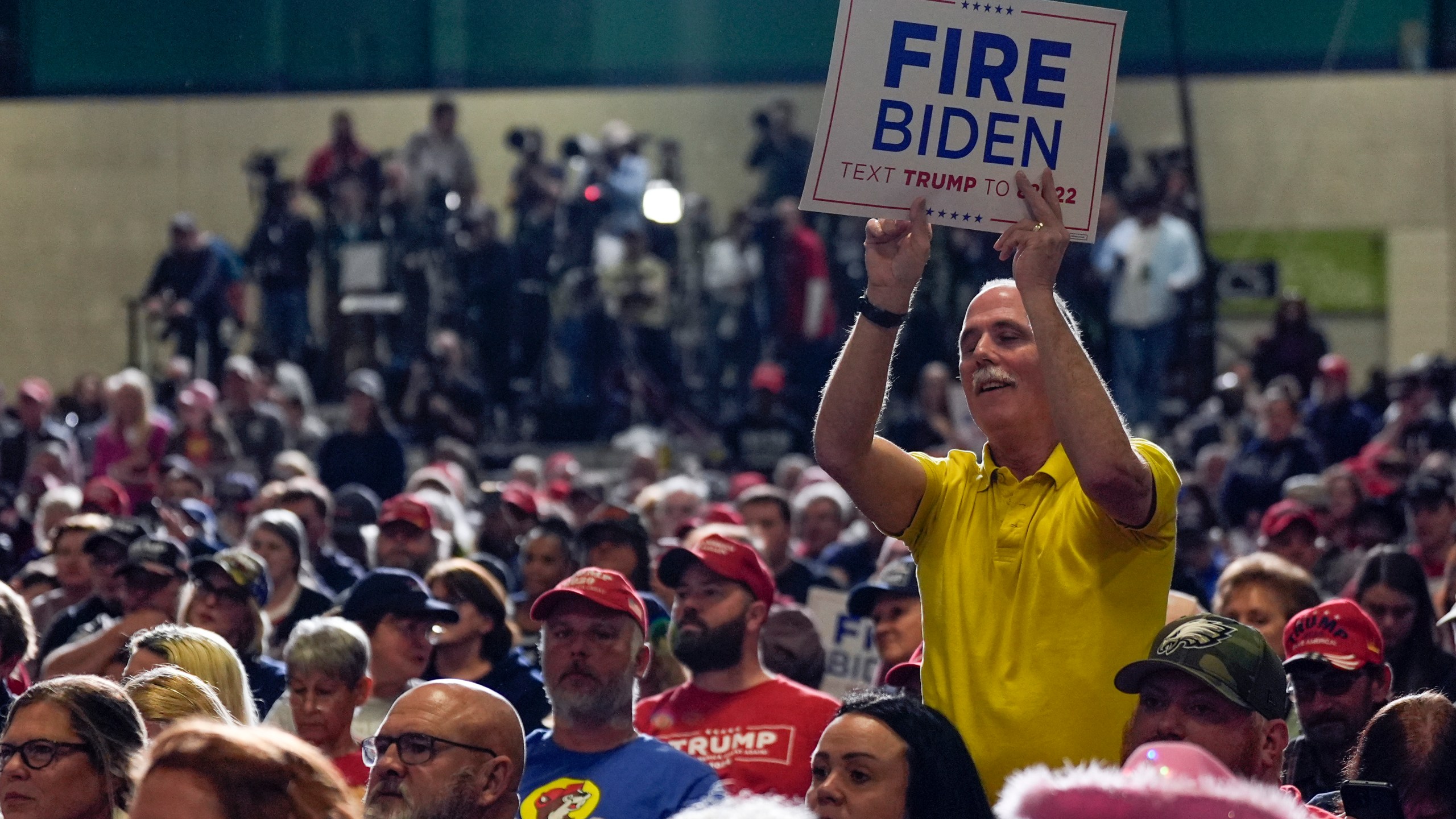 A supporter holds a sign as Republican presidential candidate former President Donald Trump speaks at a campaign rally Saturday, March 2, 2024, in Greensboro, N.C. (AP Photo/Chris Carlson)