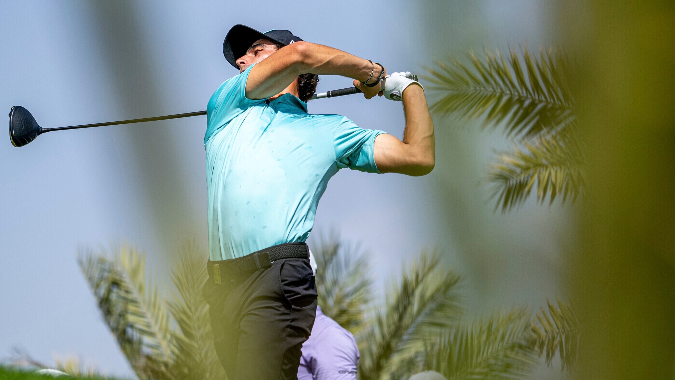 Captain Joaquín Niemann of Torque GC hits his shot from the 15th tee during the first round of LIV Golf Jeddah at the Royal Greens Golf & Country Club on Friday, March 1, 2024, in King Abdullah Economic City, Saudi Arabia. (Charles Laberge/LIV Golf via AP)