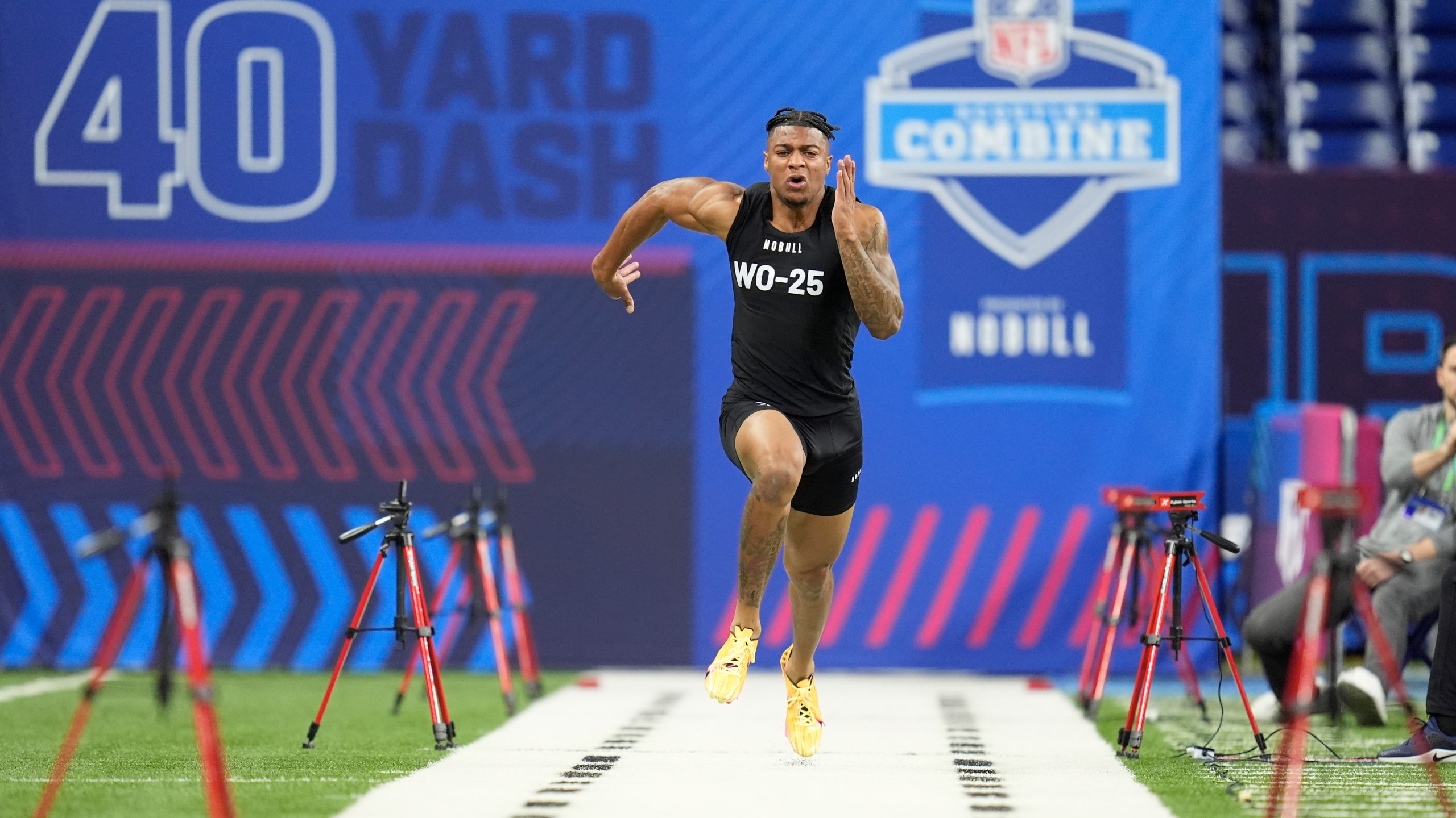 Southern California wide receiver Brenden Rice runs a drill at the NFL football scouting combine, Saturday, March 2, 2024, in Indianapolis. (AP Photo/Michael Conroy)