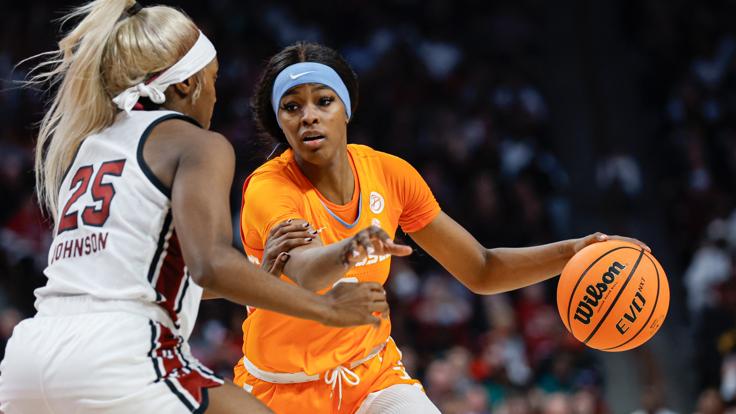 Tennessee forward Rickea Jackson, right, drives against South Carolina guard Raven Johnson (25) during the second half of an NCAA college basketball game in Columbia, S.C., Sunday, March 3, 2024. (AP Photo/Nell Redmond)