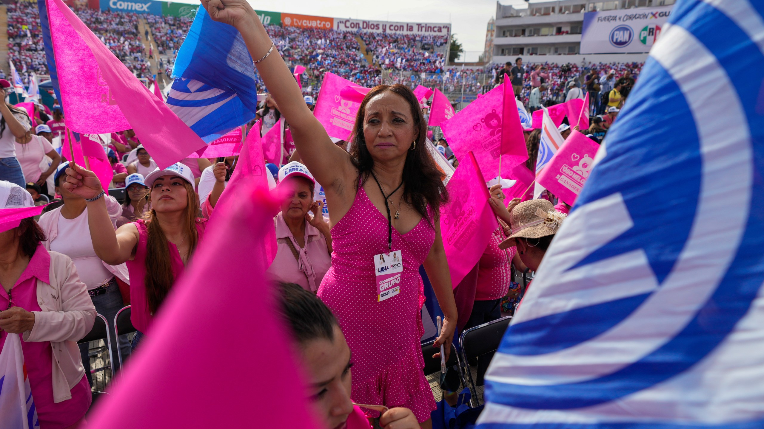 Supooterts of Presidential candidate Xóchitl Galvez attend her opening campaign rally in Irapuato, Mexico, Friday, March 1, 2024. General Elections are set for June 2.(AP Photo/Fernando Llano)