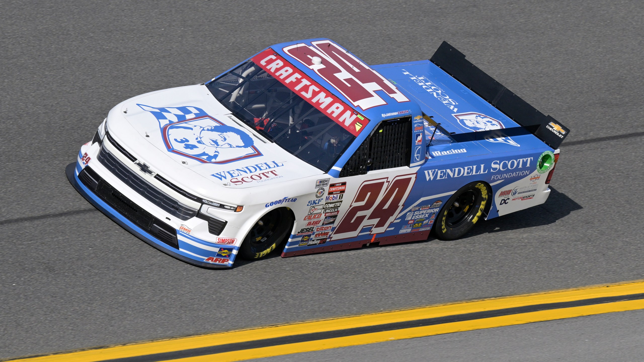 Rajah Caruth (24) during qualifying for a NASCAR truck series auto race at Daytona International Speedway, Friday, Feb. 17, 2023, in Daytona Beach, Fla. The 21-year-old student at Winston-Salem State has cracked into NASCAR's national-level series racing and on Friday, March 1, 2024, won the Truck Series race at Las Vegas Motor Speedway. (AP Photo/Phelan M. Ebenhack)