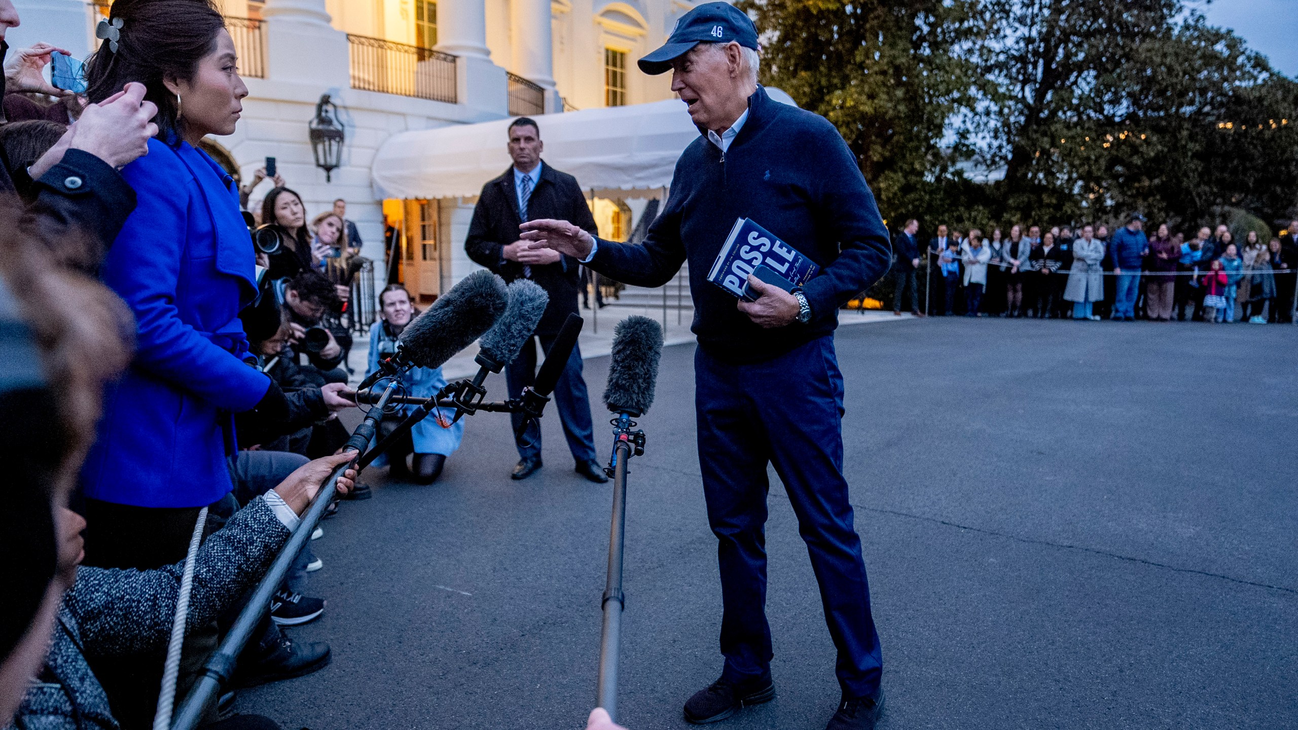 President Joe Biden speaks to members of the media before boarding Marine One on the South Lawn of the White House in Washington, Friday, March 1, 2024, to travel to Camp David, Md., for the weekend. (AP Photo/Andrew Harnik)