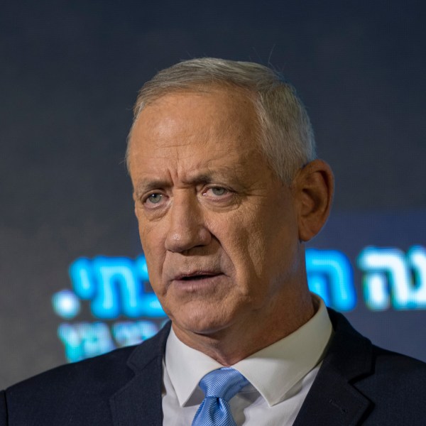 FILE - Benny Gantz speaks at the announcement of former IDF chief Gadi Eisenkot's election bid in Ramat Gan, Israel, on Aug. 14, 2022. Gantz, Eisenkot and Gideon Sa'ar have teamed up for the November elections, called the National Unity Party. Benny Gantz, who is in Washington this week for meetings with U.S. leaders, is a crucial member of Israel’s War Cabinet. He is also the top political rival to Israeli Prime Minister Benjamin Netanyahu. Gantz is a centrist politician who joined Netanyahu’s ultranationalist and religious government soon after Hamas’ Oct. 7 attack on southern Israel. (AP Photo/Tsafrir Abayov, File)