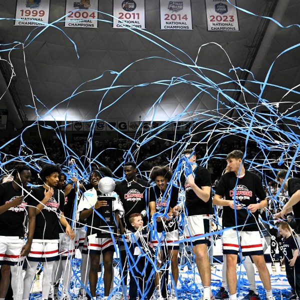 UConn celebrates winning their first outright Big East regular-season title in 25 years after an NCAA college basketball game against Seton Hall, Sunday, March 3, 2024, in Storrs, Conn. (AP Photo/Jessica Hill)
